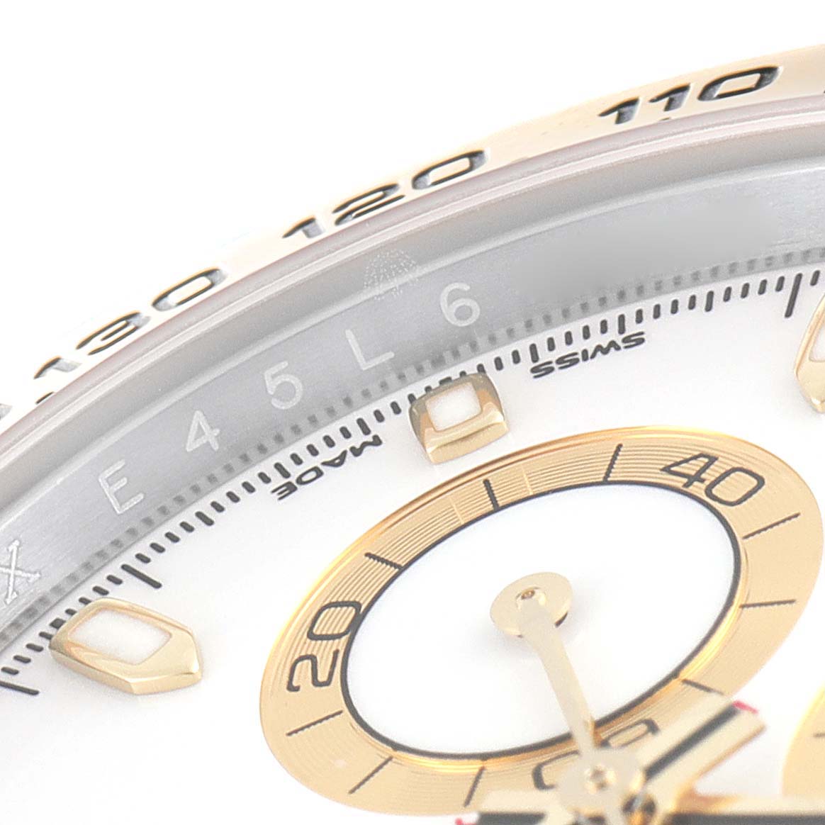 The image shows a close-up of the dial and bezel of the Rolex Daytona 116503 Men
s Steel and Gold (two tone) White Dial 116503 Men
s Steel and Gold (two tone) White Dial watch model.