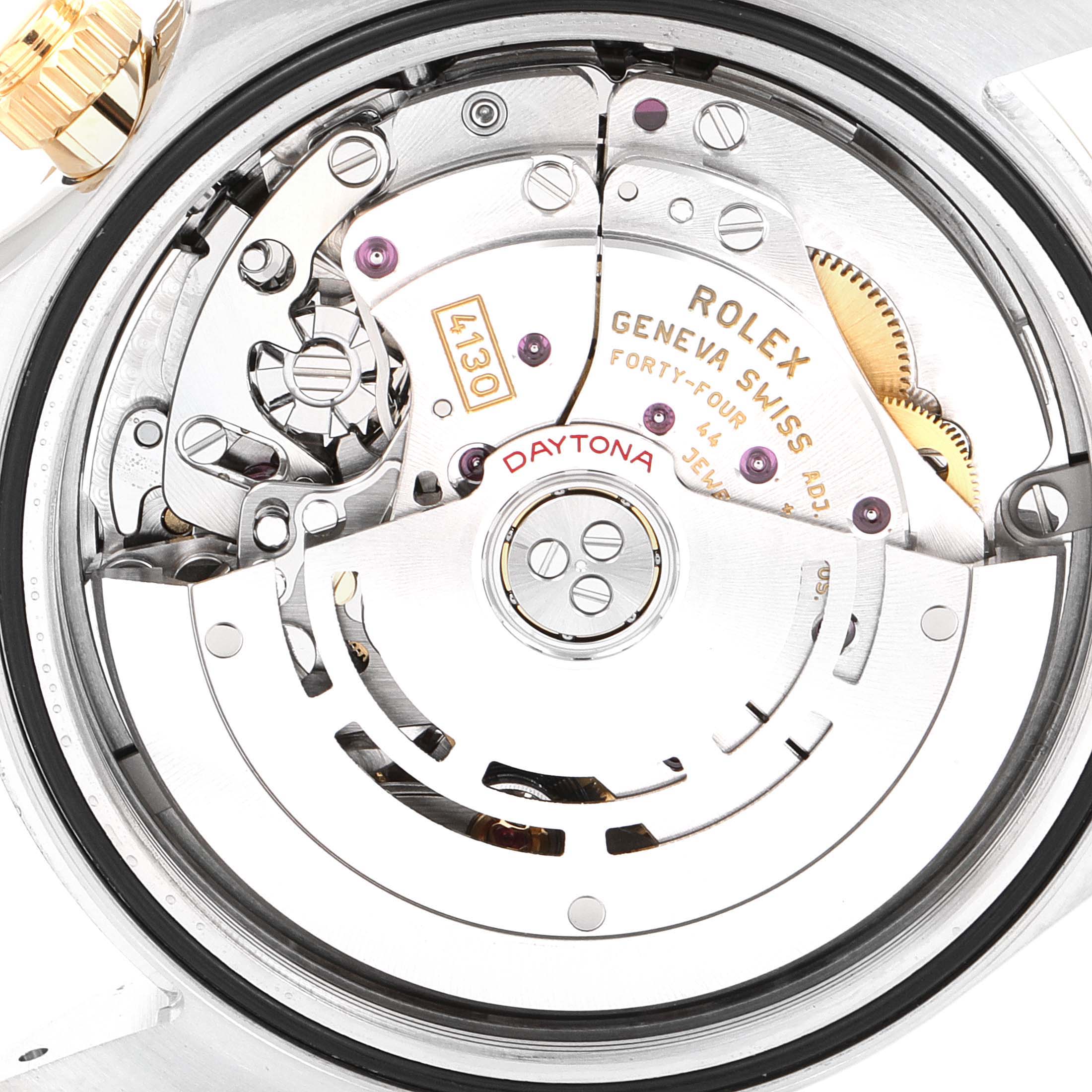 The image shows a detailed view of the Rolex Daytona 116503 Men
s Steel and Gold (two tone) White Dial 116503 Men
s Steel and Gold (two tone) White Dial watch
s movement, focusing on the internal mechanisms and markings.