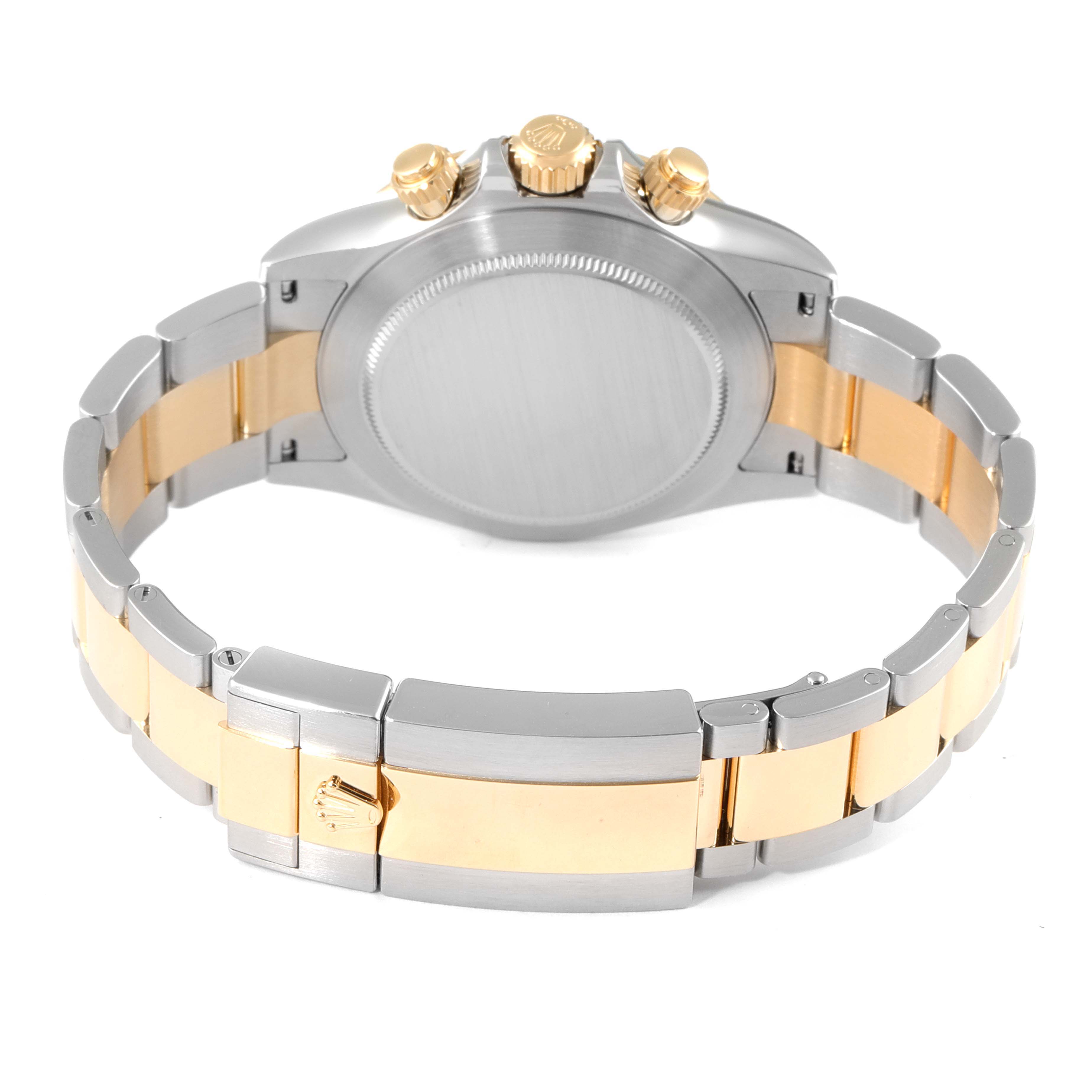 This image shows the back view of a Rolex Daytona 116503 Men
s Steel and Gold (two tone) White Dial 116503 Men
s Steel and Gold (two tone) White Dial watch, highlighting the clasp and case back.