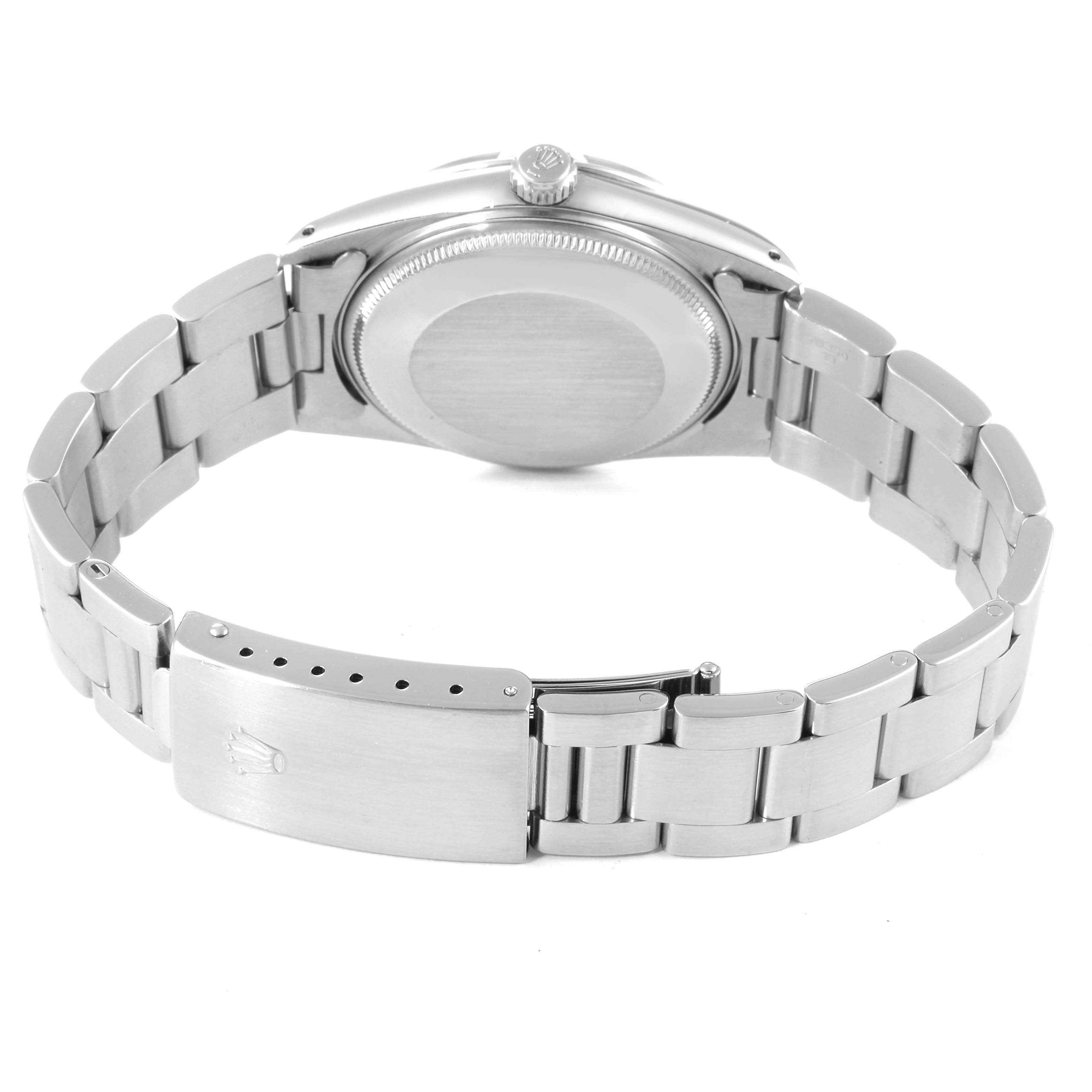 The image shows the back view and clasp of a Rolex Vintage Collection 15000 Men's Stainless Steel Silver Dial 15000 Men's Stainless Steel Silver Dial watch.