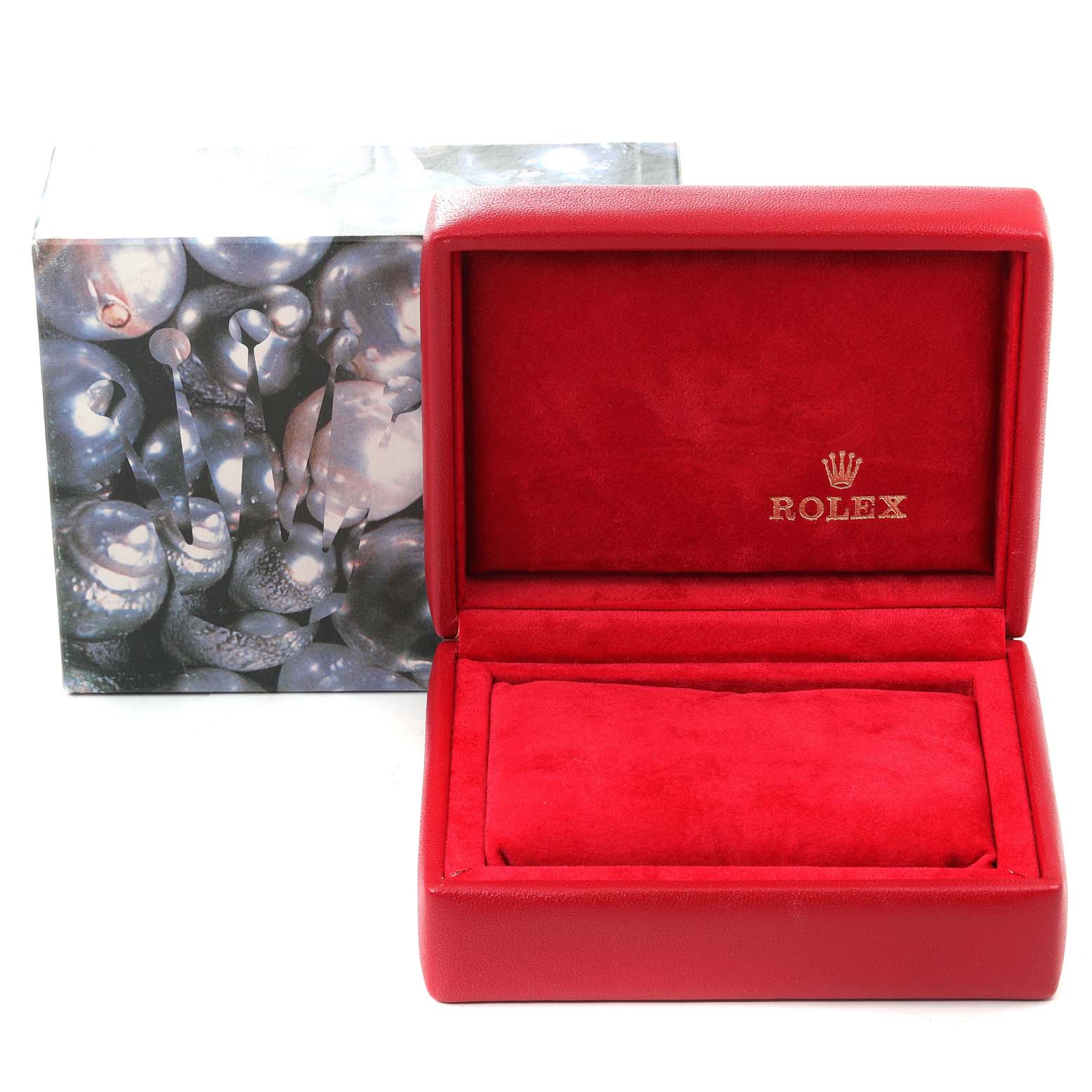 The image shows an open red Rolex Datejust 69173 Women's Steel and Gold (two tone) Champagne Dial 69173 Women's Steel and Gold (two tone) Champagne Dial watch box with a cushioned interior, placed in front of its outer packaging.