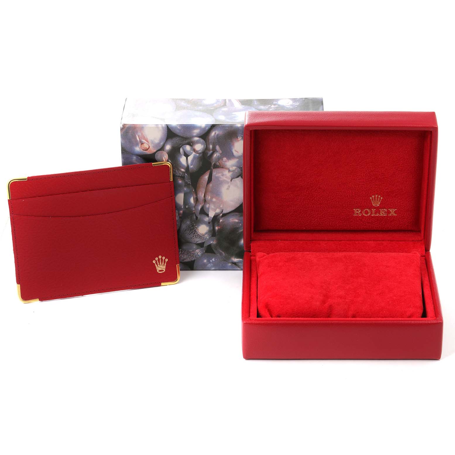 This image shows a Rolex Datejust 69173 Women's Steel and Gold (two tone) Blue Dial 69173 Women's Steel and Gold (two tone) Blue Dial watch box and cardholder from an angled top view.