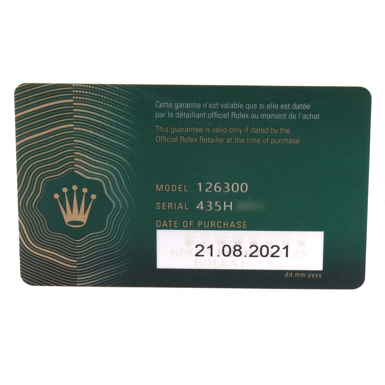 This image shows a green warranty card for a Rolex Datejust 41 126300 Men's Stainless Steel Blue Dial 126300 Men's Stainless Steel Blue Dial model 126300, detailing the serial number and date of purchase.