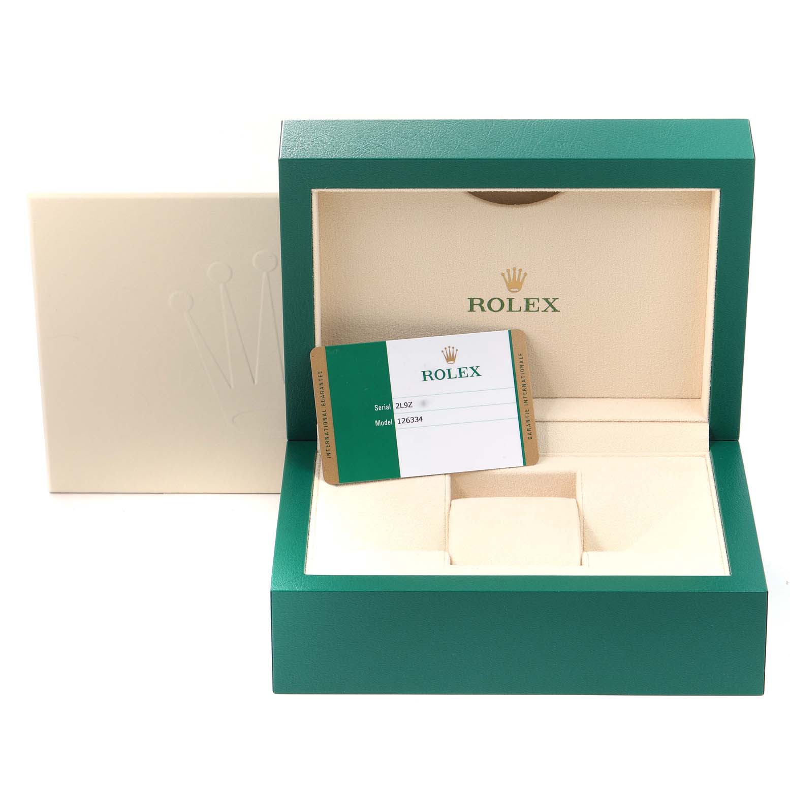 The image shows the packaging of a Rolex Datejust 41 126334 Men's Stainless Steel Blue Dial 126334 Men's Stainless Steel Blue Dial, including the green box, cream interior, and a green warranty card.