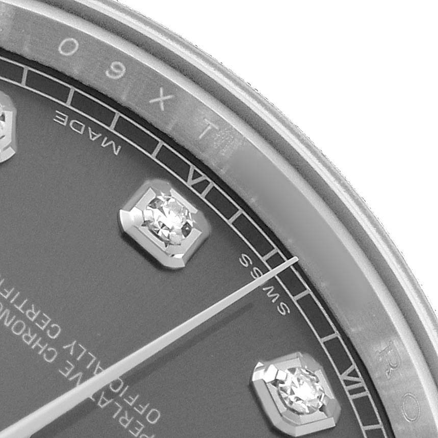 The image shows a close-up of the Rolex Datejust 41 116334 Men's Stainless Steel Silver Dial dial at an angle, highlighting the diamond hour markers and part of the minute hand.
