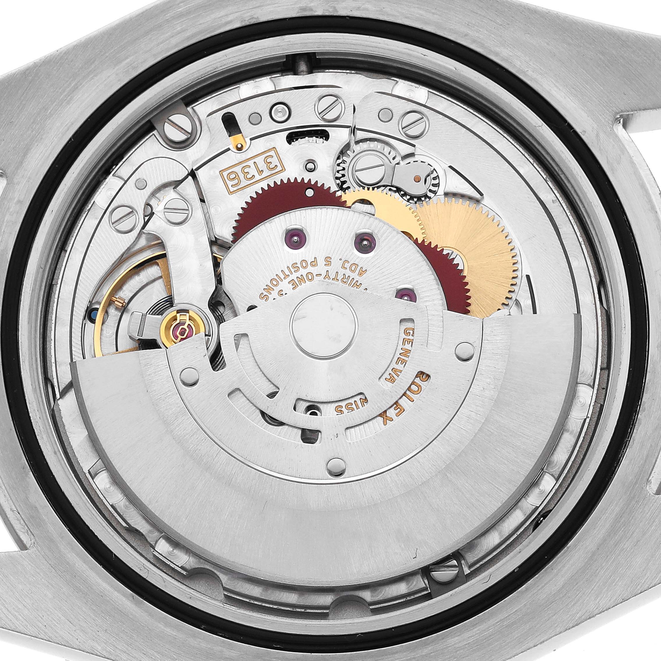 The image shows the movement of a Rolex Datejust 41 116334 Men's Stainless Steel Silver Dial, highlighting gears and components from a back angle.