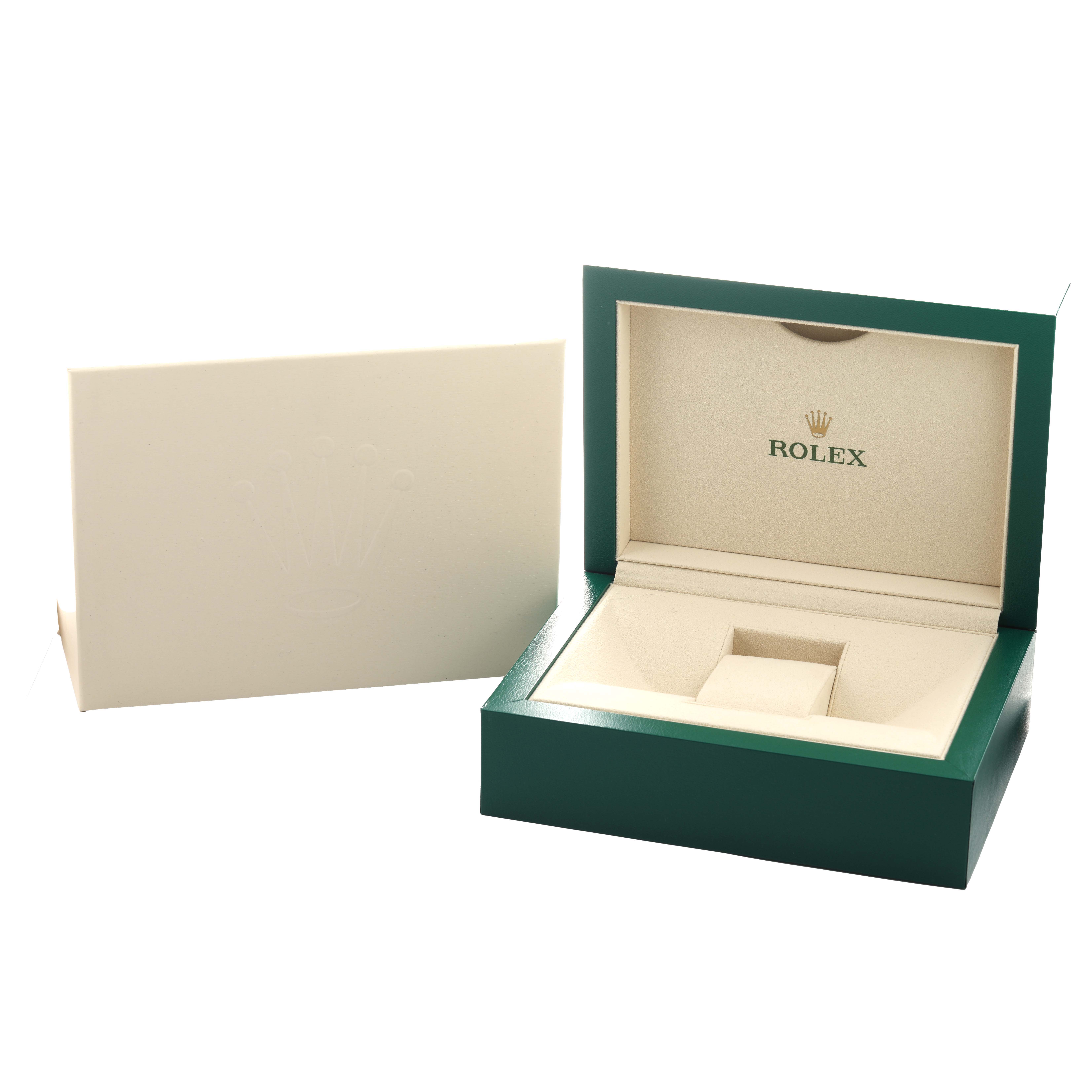 The image shows a green Rolex box for the Datejust 41 with an open lid and an accompanying cream-colored outer box.