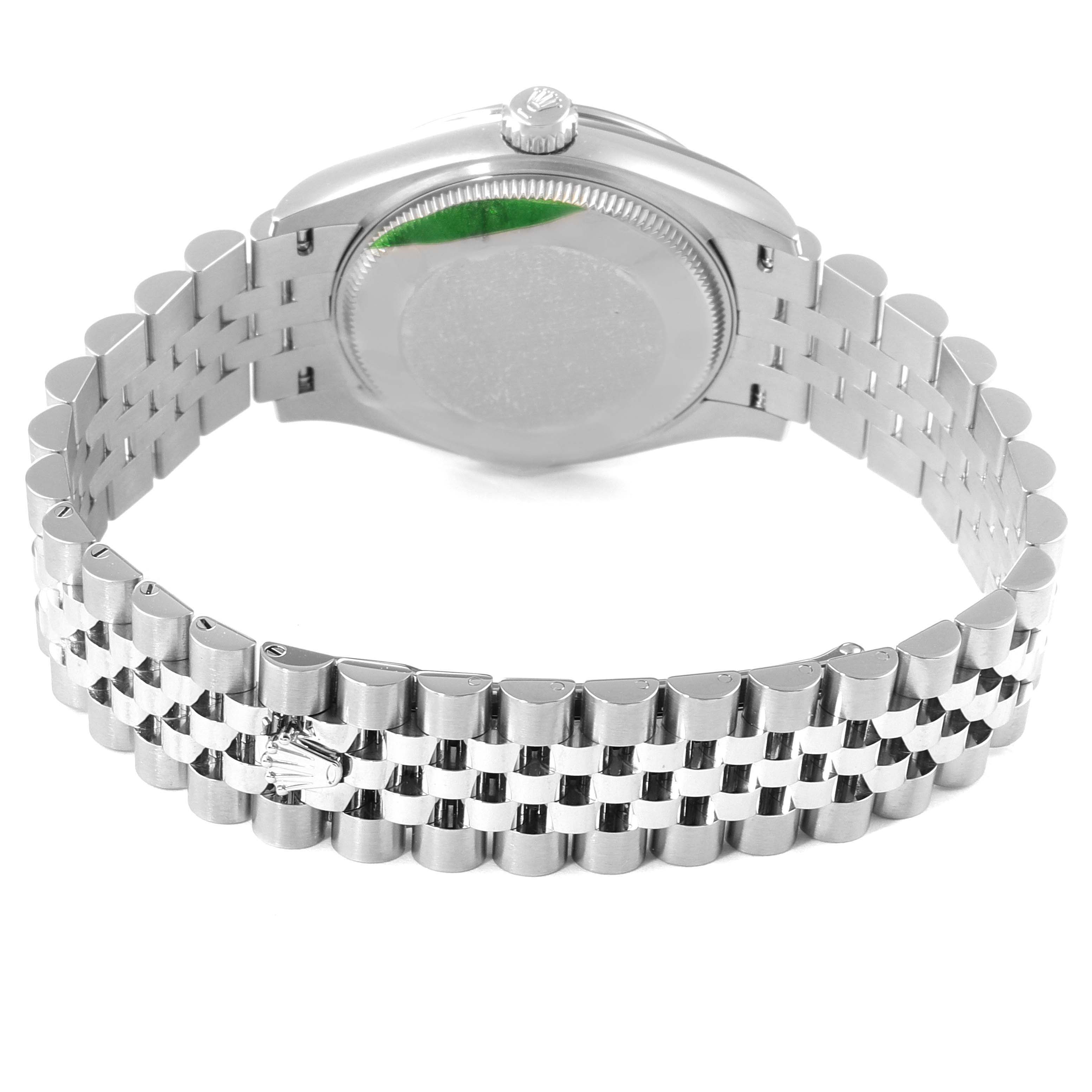 This image shows the back case and metal bracelet of a Mid-Size Rolex watch from a rear angle.