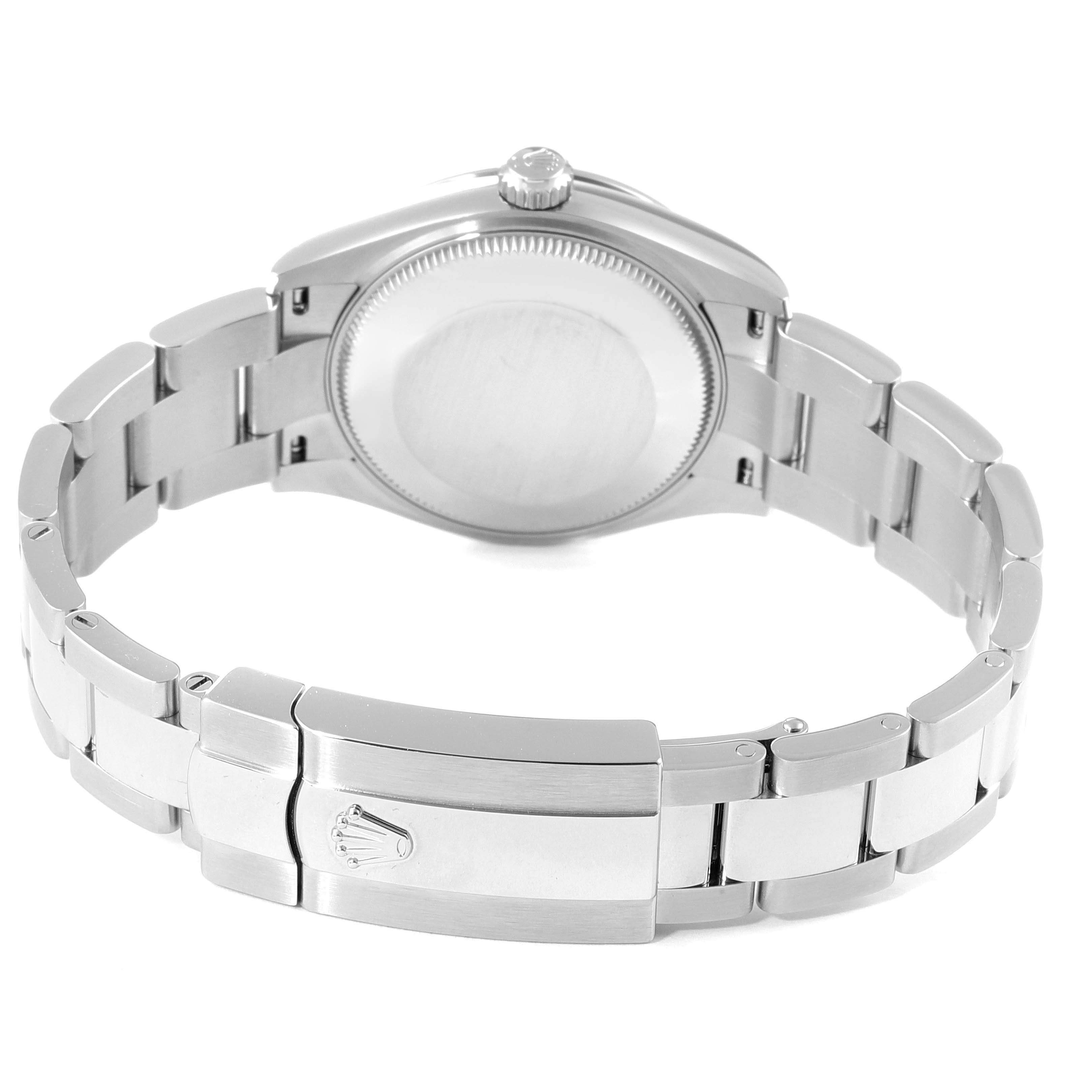 This image of the Rolex Mid-Size 278274 Women's Stainless Steel Blue Dial 278274 Women's Stainless Steel Blue Dial watch shows the back view with the bracelet and clasp visible.