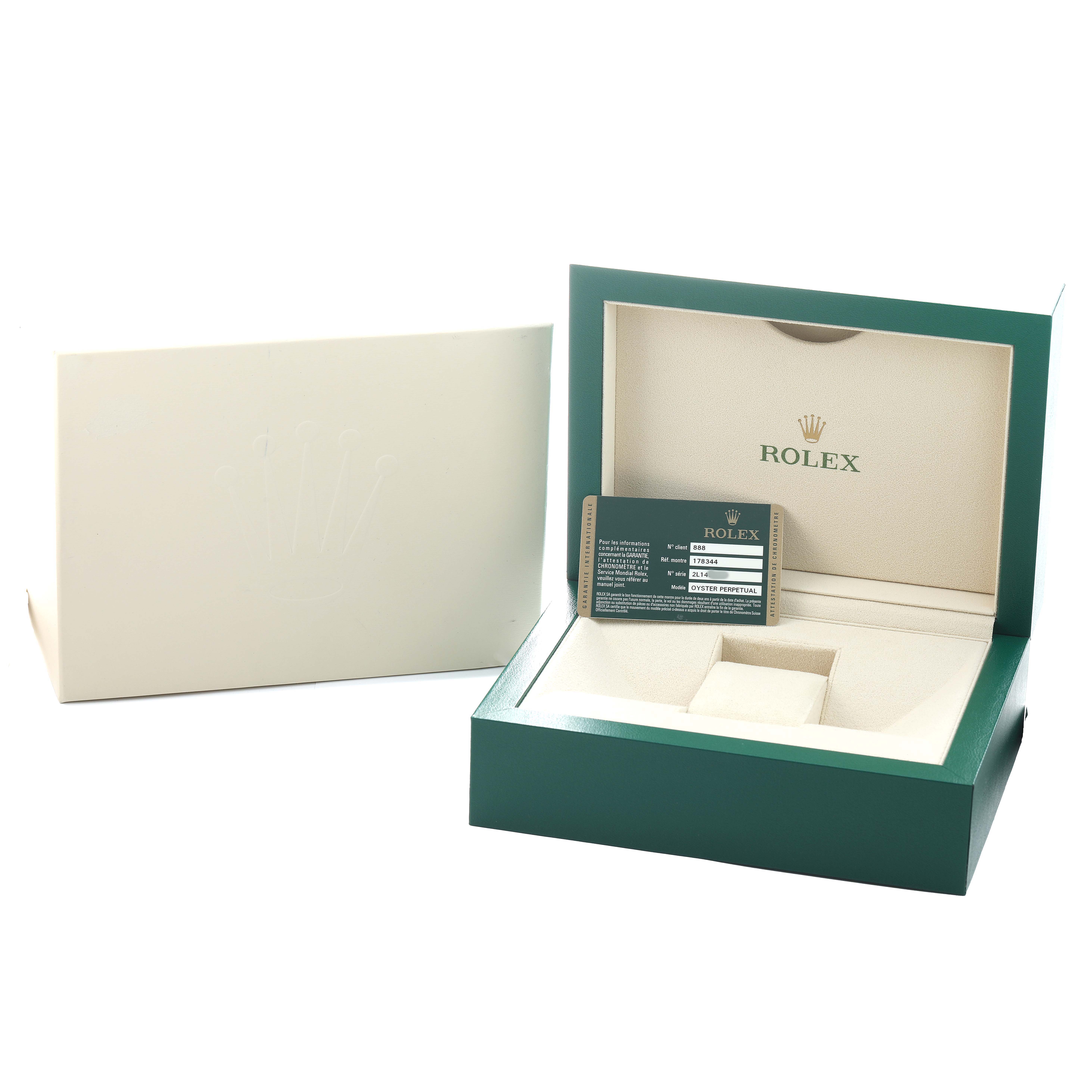 The image shows an open Rolex Datejust 178344 Women's Stainless Steel Black Dial watch box with a warranty card and outer sleeve.