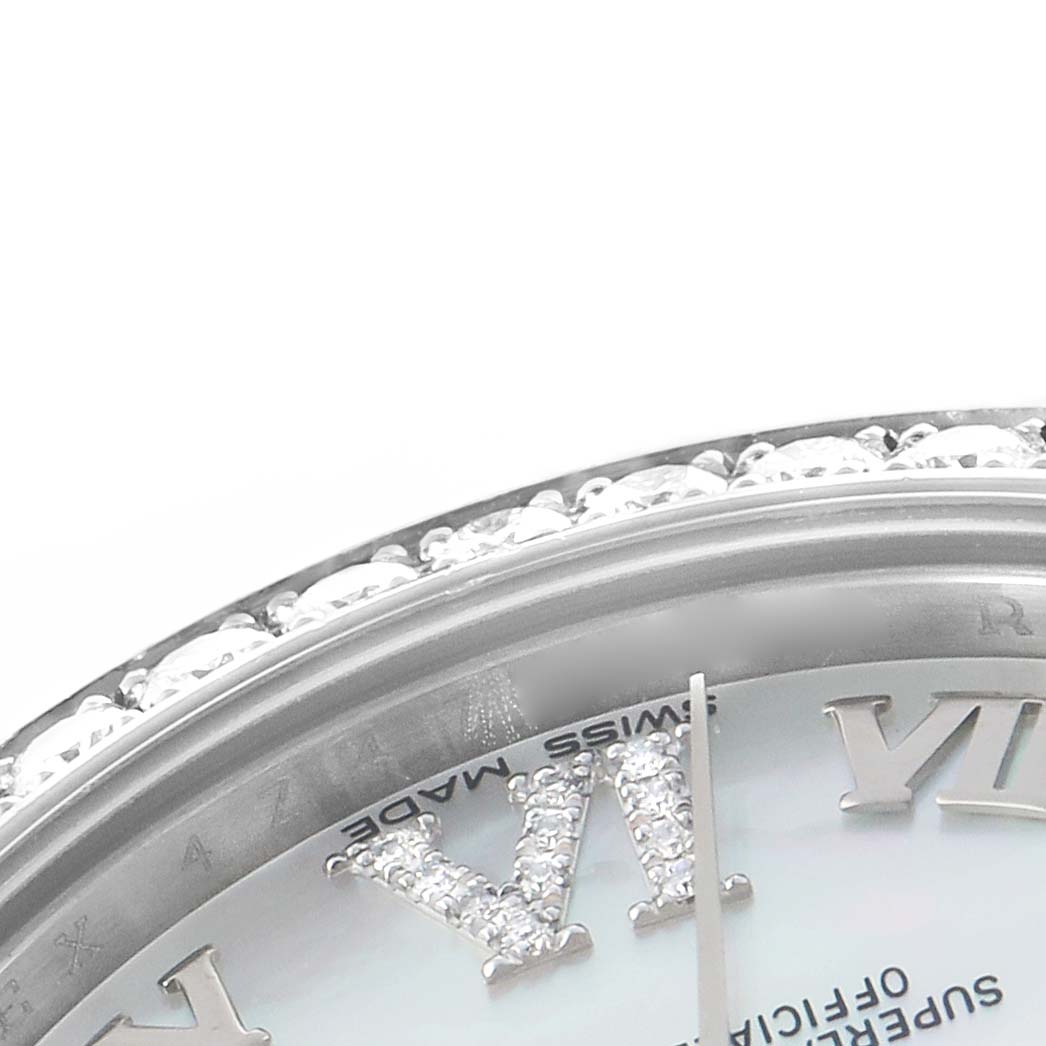 The image shows a close-up of the Roman numeral "VI" with diamonds and part of the bezel on a Rolex Datejust 178384 Women's Stainless Steel Mother of Pearl Dial watch.