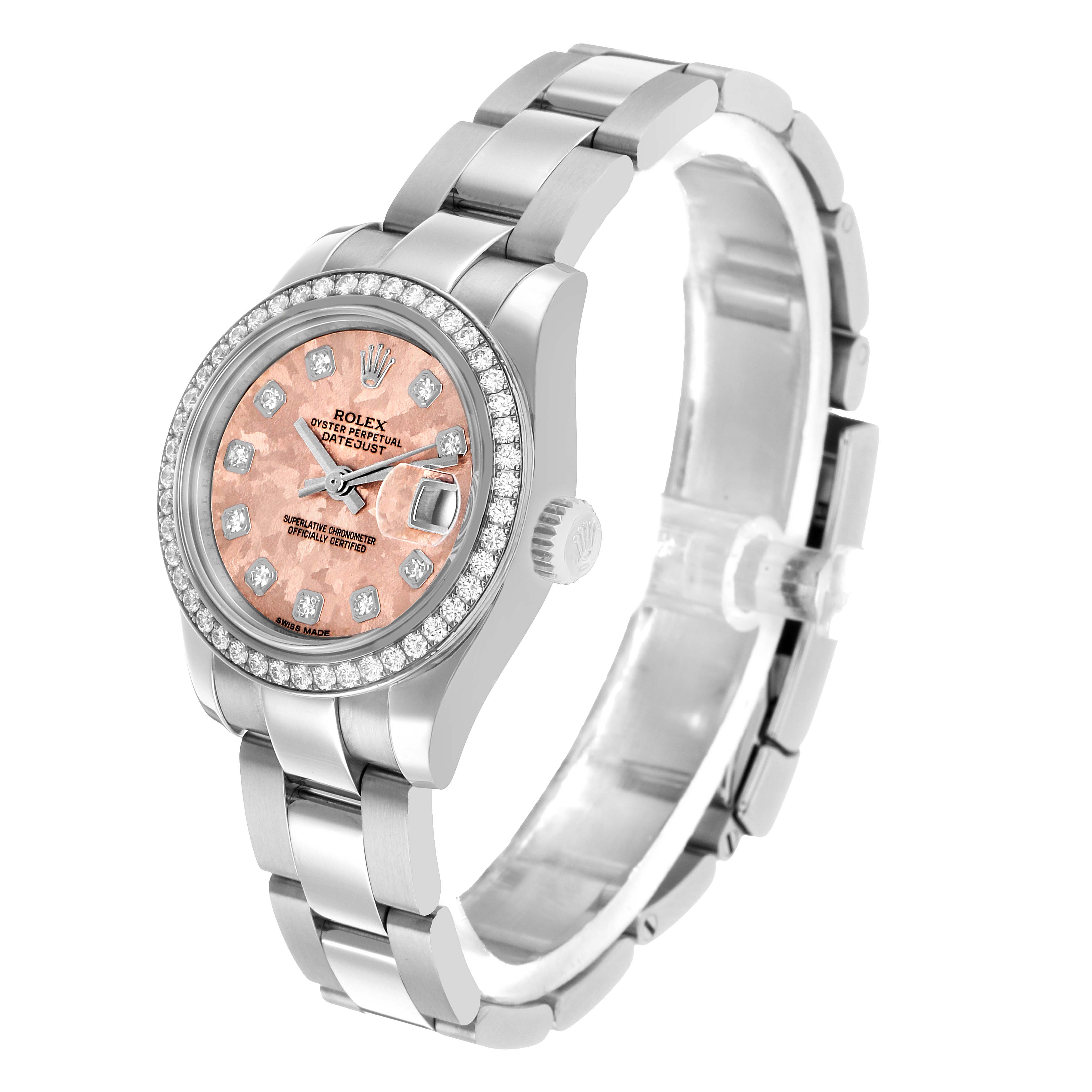 The Rolex Datejust 179384 Women's Stainless Steel Pink Dial watch is shown at a three-quarter angle, featuring the face, bezel, and part of the bracelet.