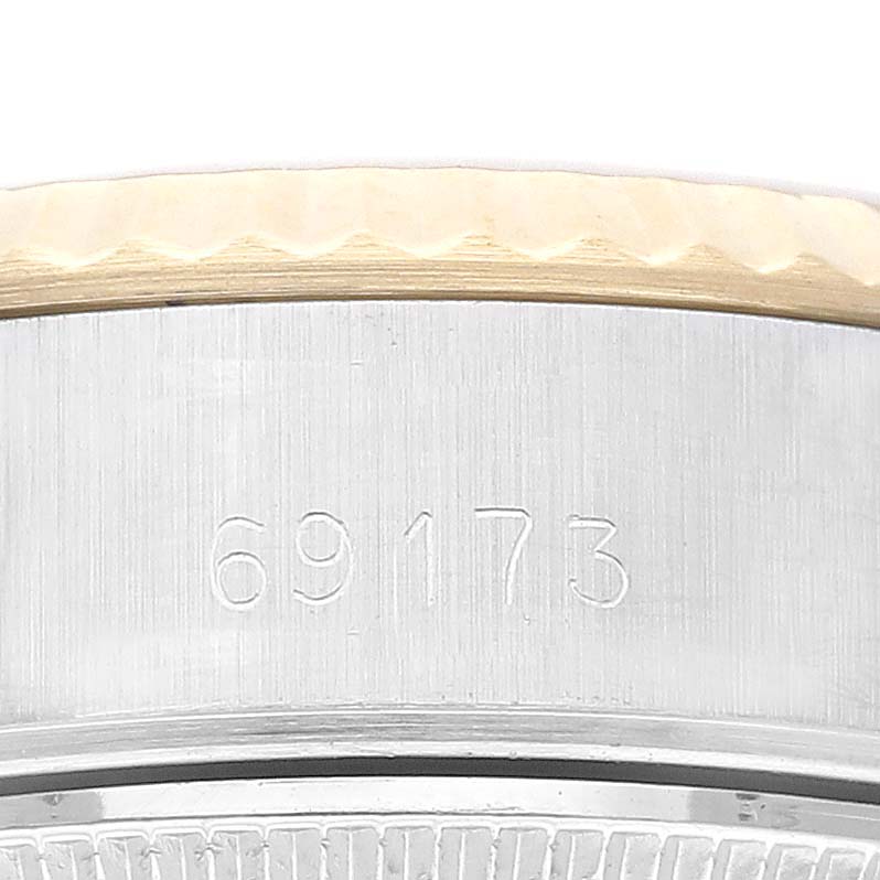 The image shows a close-up of the case side of a Rolex Datejust 69173G Women's Steel and Gold (two tone) Champagne Dial 69173G Women's Steel and Gold (two tone) Champagne Dial watch, displaying the model number 69173 and part of the bezel.