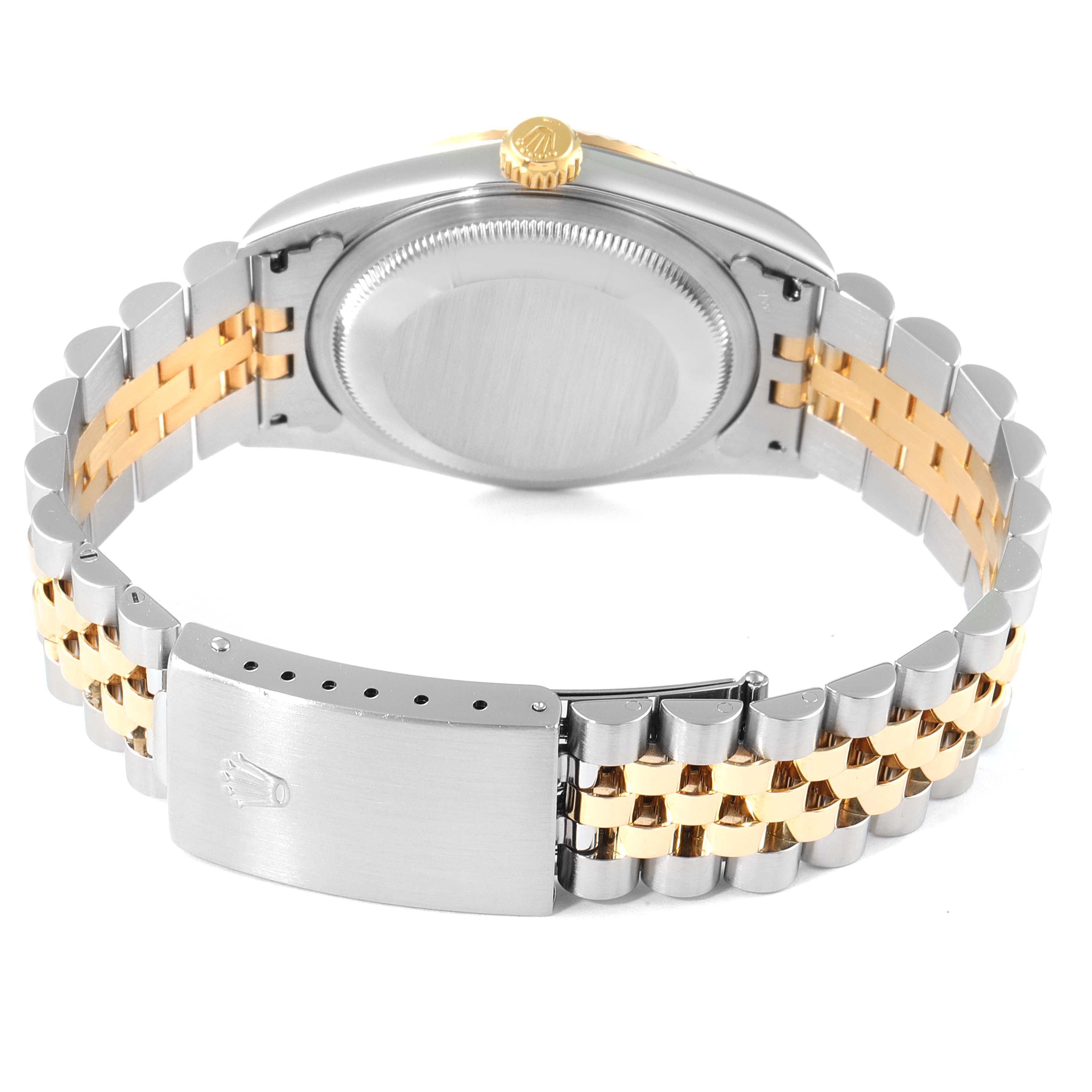 This image shows the back of a Rolex Datejust 16233 Men's Steel and Gold (two tone) White Dial 16233 Men's Steel and Gold (two tone) White Dial watch, highlighting the case back, crown, and Jubilee bracelet with a clasp.