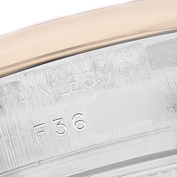 The image shows a close-up of the side of the Rolex Datejust 179163 Women's Steel and Gold (two tone) White Dial 179163 Women's Steel and Gold (two tone) White Dial watch case, highlighting the "STAINLESS" engraving.