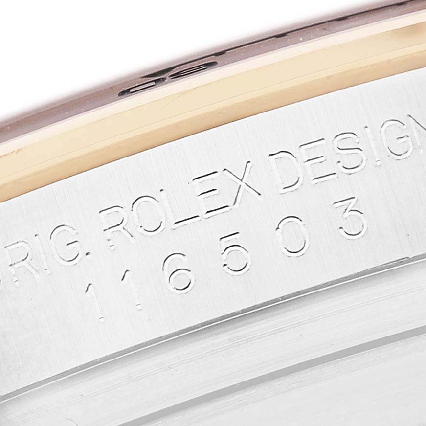 The image shows a close-up of the engraved case side of a Rolex Daytona 116503 Men's Steel and Gold (two tone) Mother of Pearl Dial, featuring the model number.