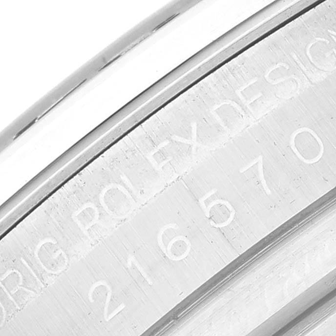 The image shows a close-up of the case side engraving detailing for the Rolex Explorer 216570 Men
s Stainless Steel Black Dial 216570 Men
s Stainless Steel Black Dial watch.
