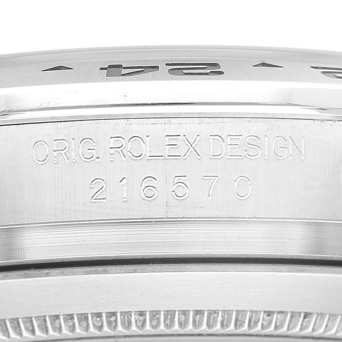 The image shows a close-up of the case side and bezel of a Rolex Explorer 216570 Men's Stainless Steel White Dial 216570 Men's Stainless Steel White Dial model wristwatch, displaying its design number "216570."