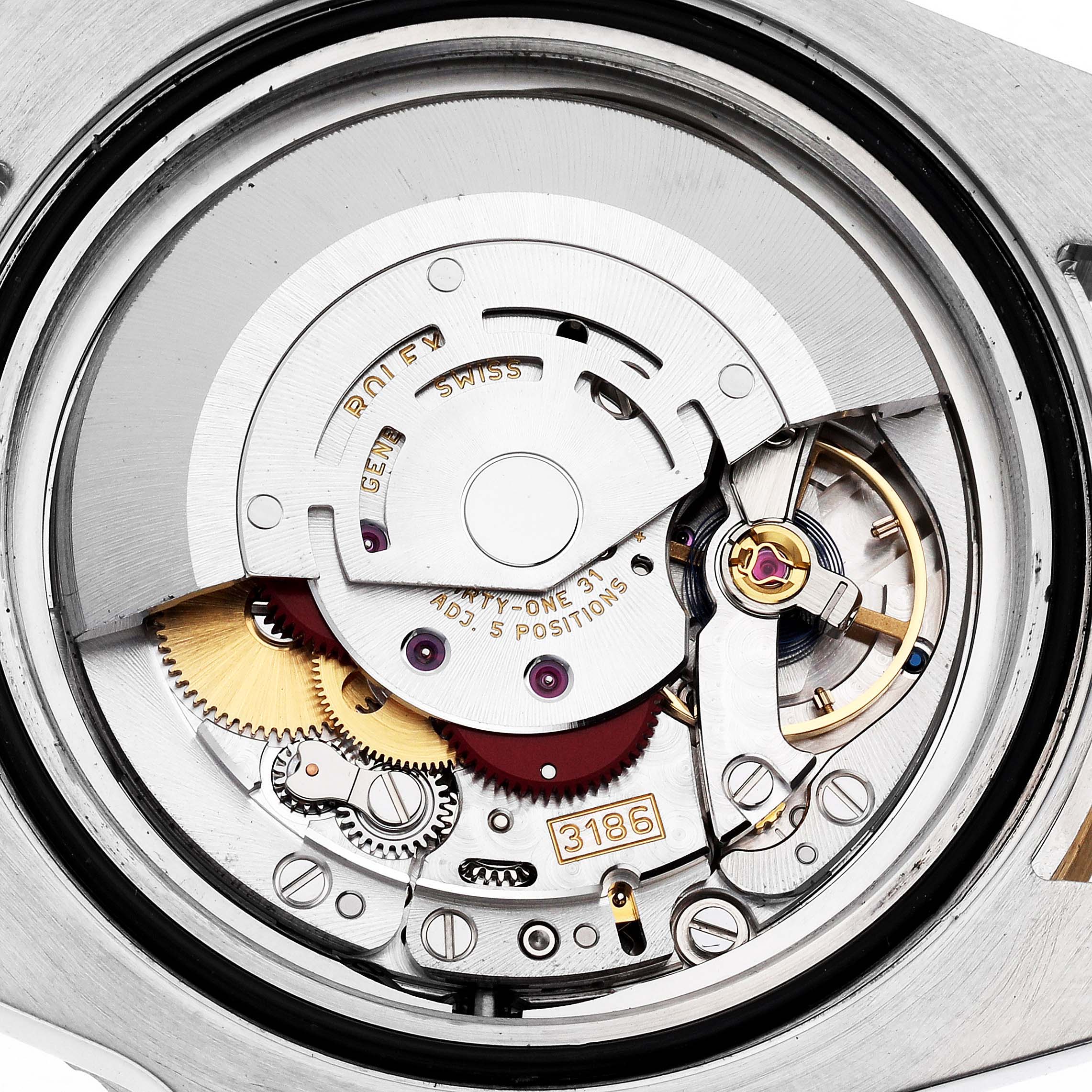 The image shows the movement of the Rolex GMT-Master 116713 Men's Steel and Gold (two tone) Black Dial watch, highlighting its intricate gears and components from a top-down angle.