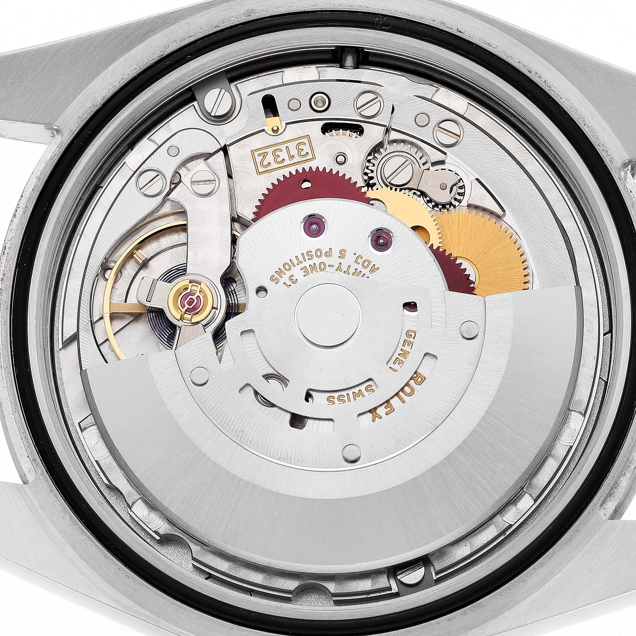 This image shows the internal movement mechanism of a Rolex Oyster Perpetual 114300 Men's Stainless Steel Grey Dial 114300 Men's Stainless Steel Grey Dial watch viewed from the back.
