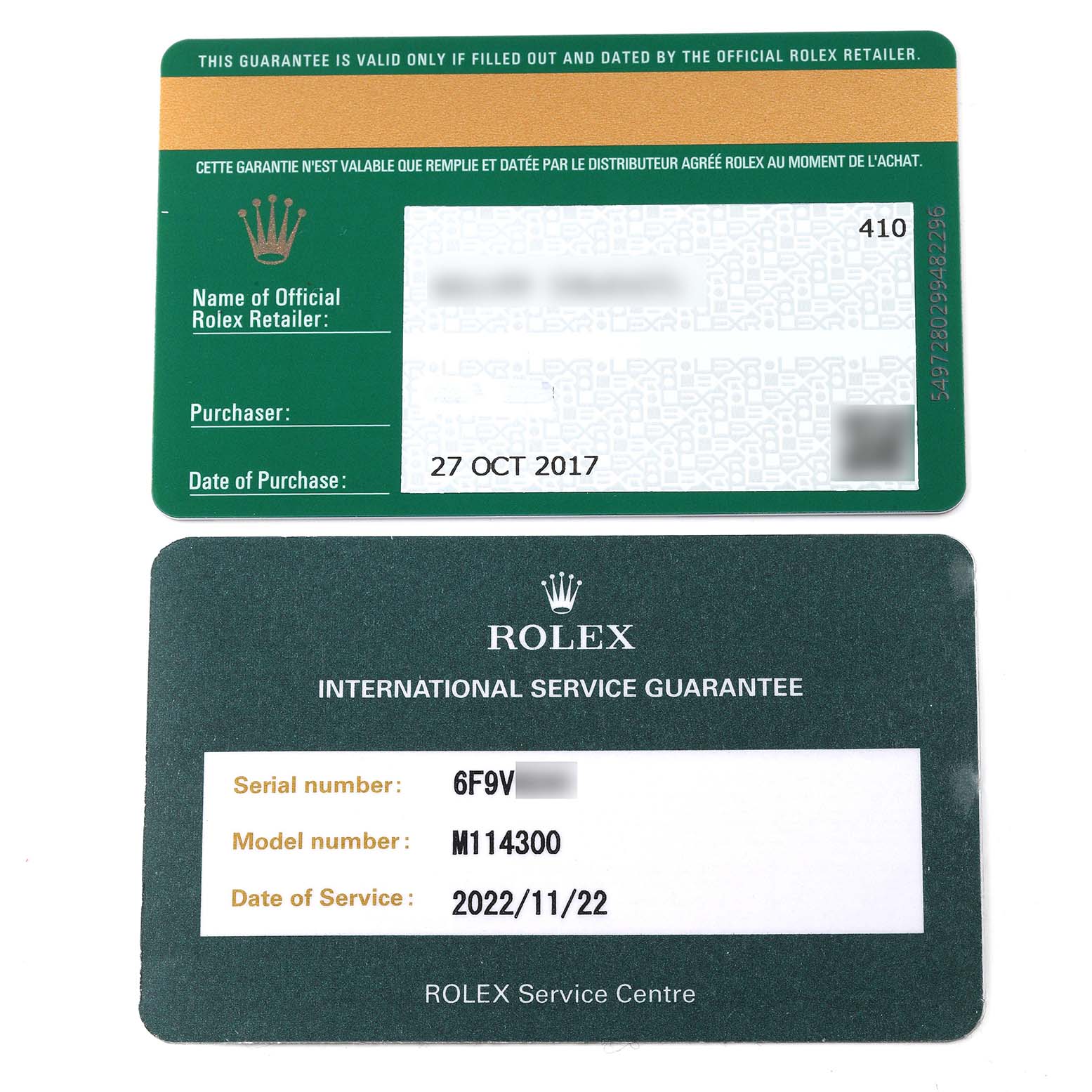 The image shows a guarantee card and a service guarantee card for a Rolex Oyster Perpetual 114300 Men's Stainless Steel Grey Dial 114300 Men's Stainless Steel Grey Dial model.