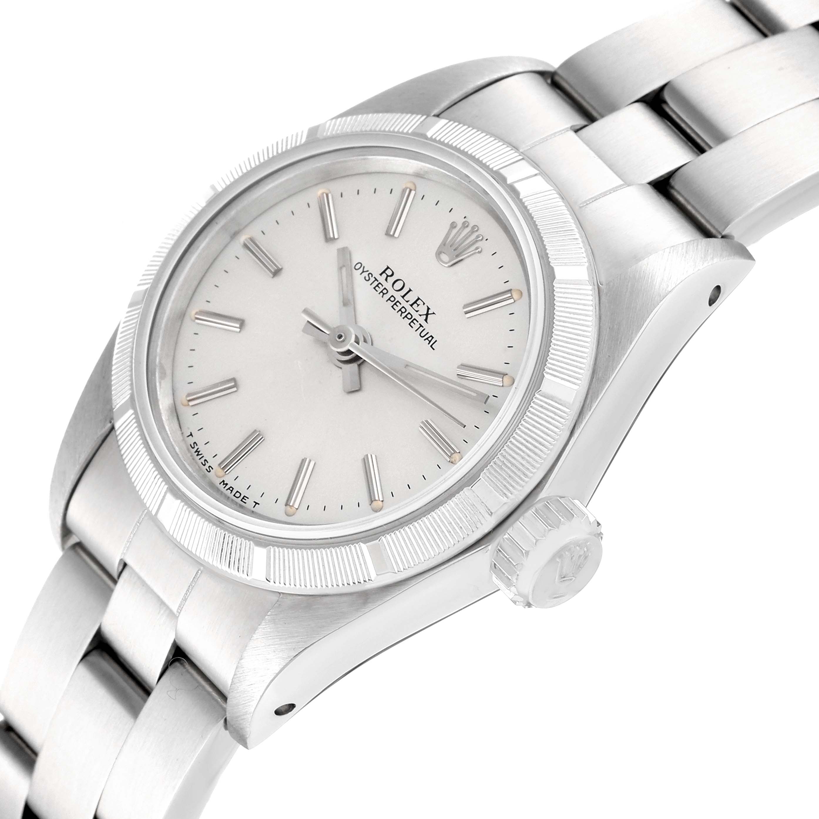 The image shows a Rolex Oyster Perpetual 67230 Women's Stainless Steel Silver Dial 67230 Women's Stainless Steel Silver Dial watch at a slight angle, highlighting the dial, bezel, and part of the bracelet.