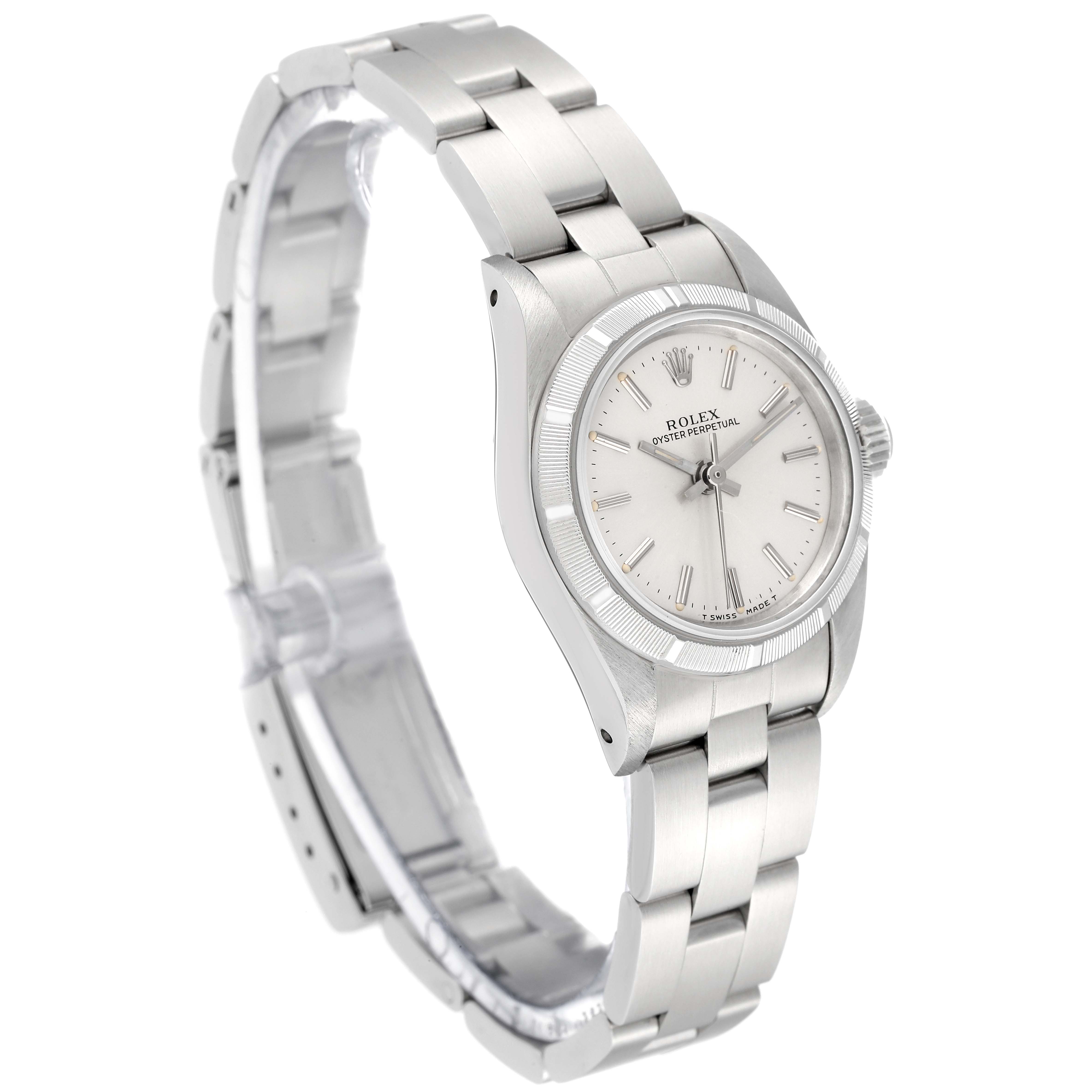 The Rolex Oyster Perpetual 67230 Women's Stainless Steel Silver Dial 67230 Women's Stainless Steel Silver Dial watch is shown at a slight angle, displaying its face, bezel, and bracelet.