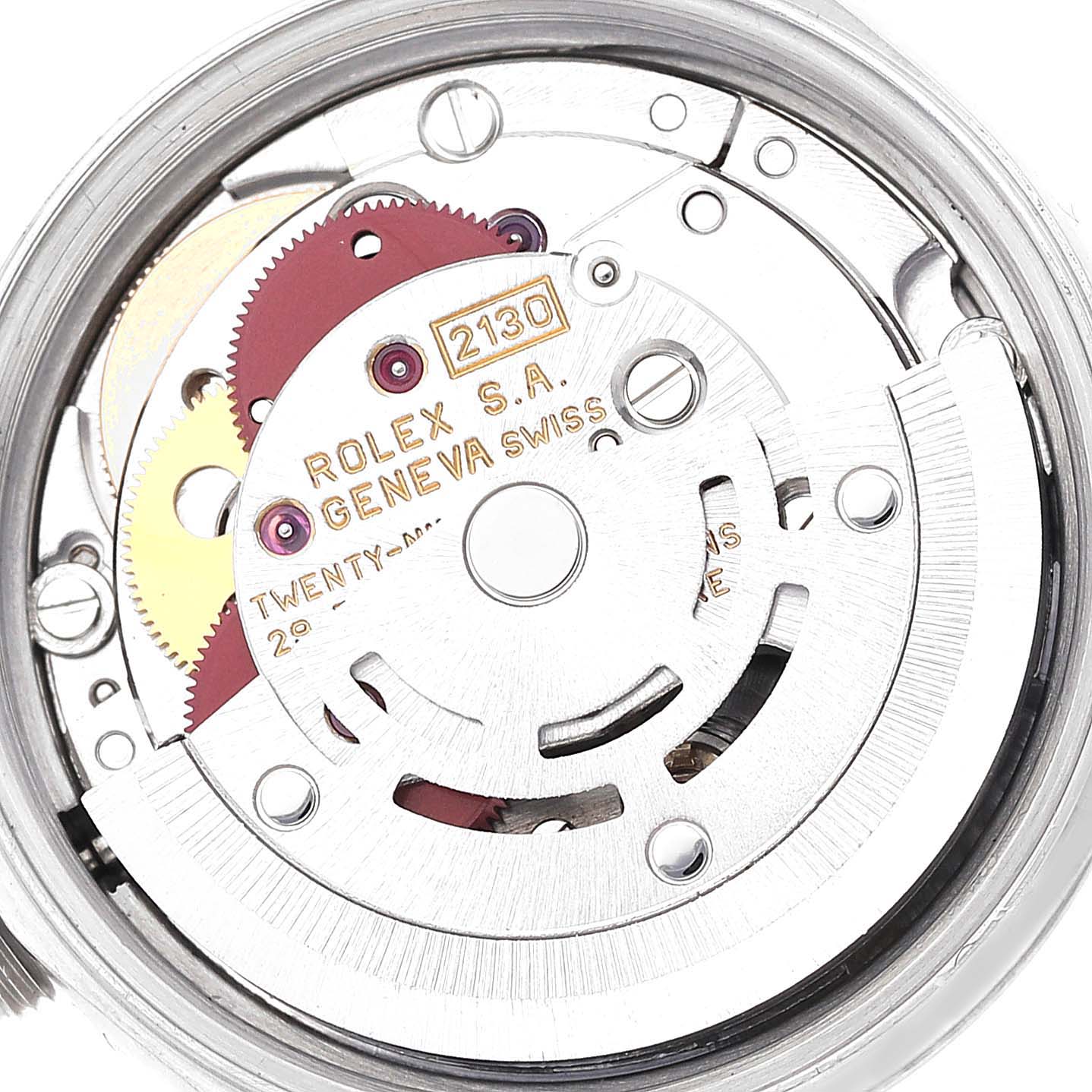 This is an image showing the internal mechanism of a Rolex Oyster Perpetual 67230 Women's Stainless Steel Silver Dial 67230 Women's Stainless Steel Silver Dial watch, specifically the movement component model 2130.