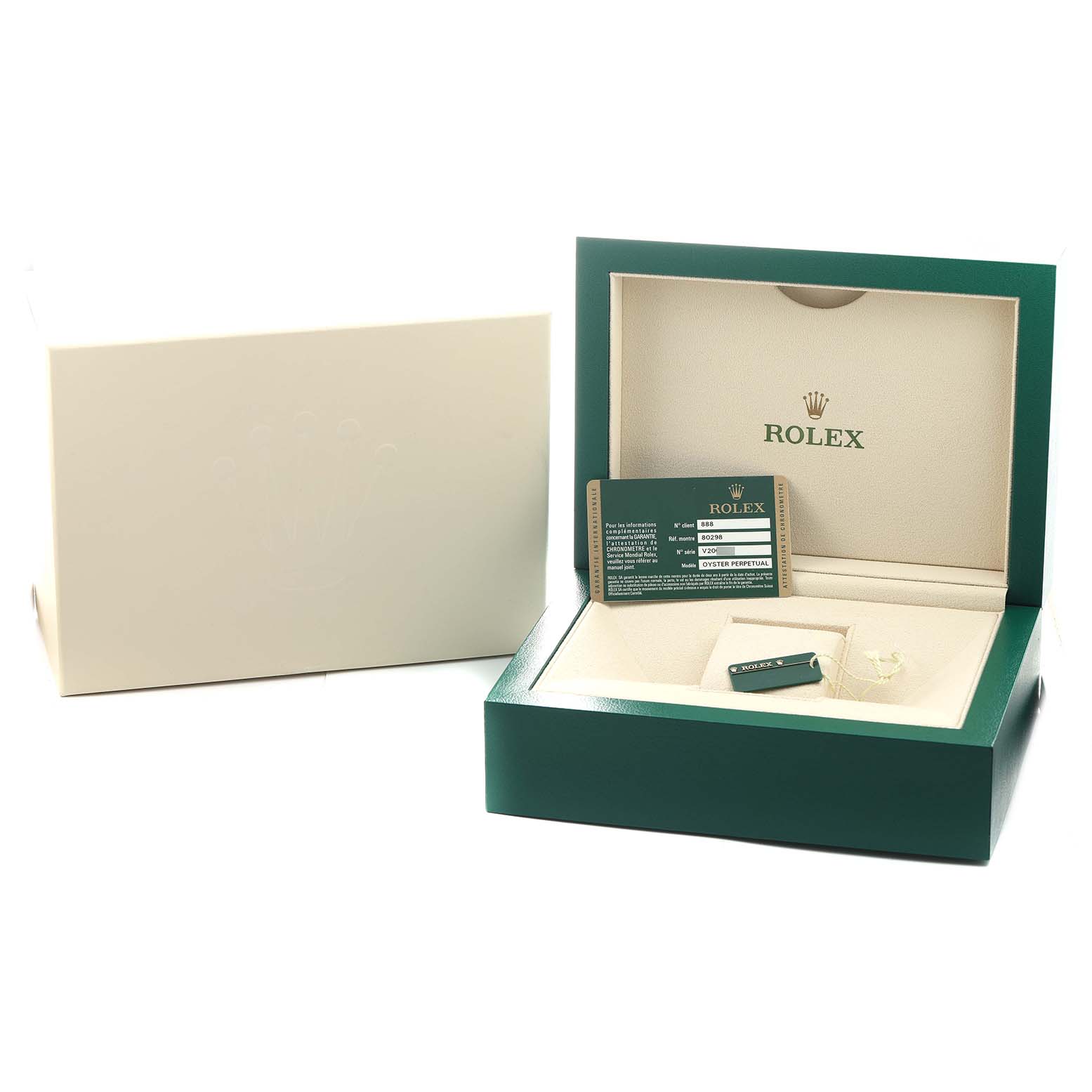 The image shows the packaging and accessories for a Rolex Pearlmaster 80298 Women's Yellow Gold White Dial, including an open box, card, and tag, viewed from a frontal angle.