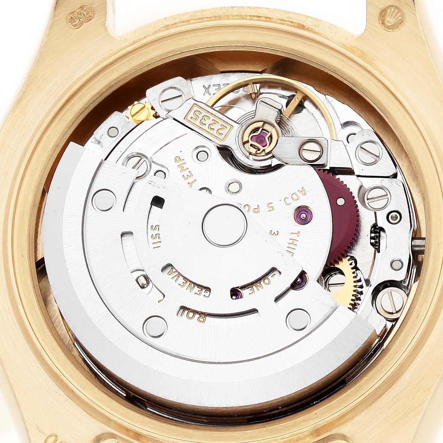 The image shows the intricate movement of a Rolex Pearlmaster 80298 Women's Yellow Gold White Dial watch from the back, highlighting its internal mechanics.