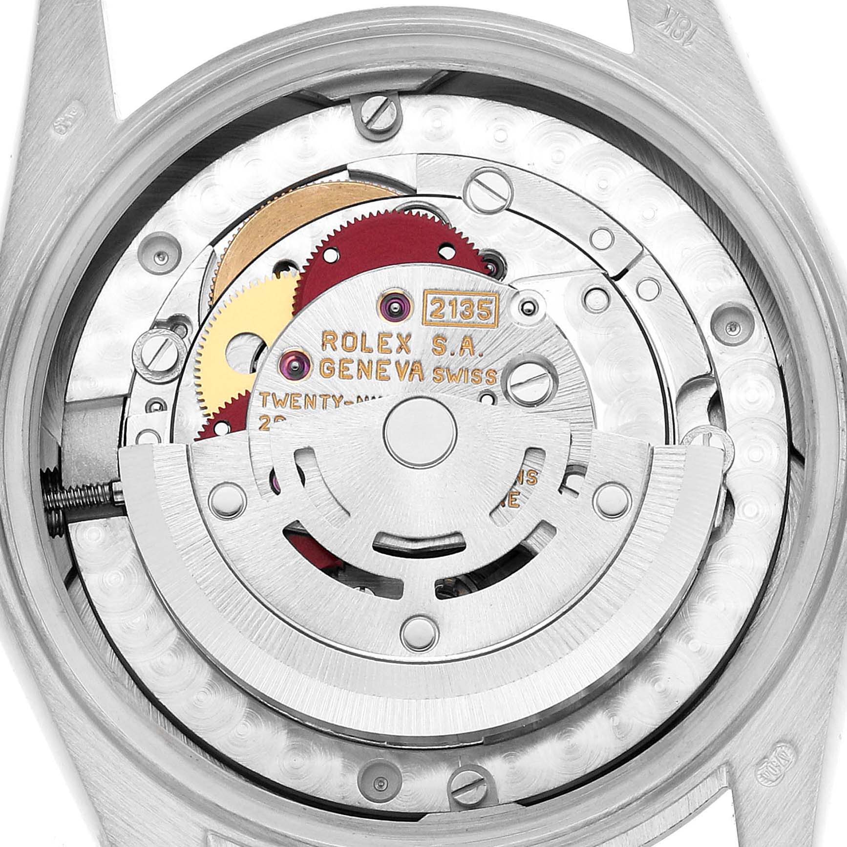 The image shows the internal mechanism of a Rolex President 68279 Women's White Gold Silver Dial watch from a rear angle, highlighting gears and the rotor.
