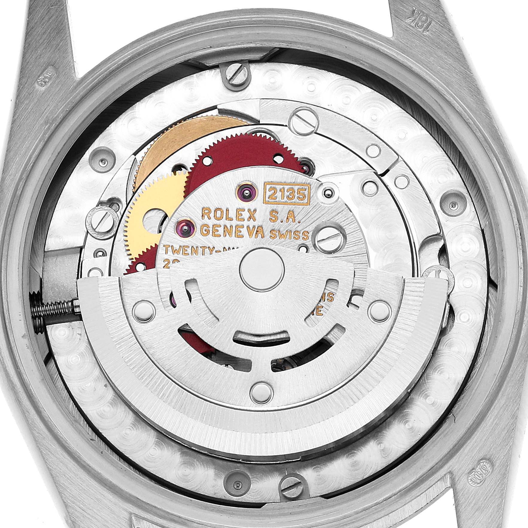 The image shows the movement of a Rolex President 68279 Women's White Gold Silver Dial watch from the back, highlighting its gears and inscriptions.