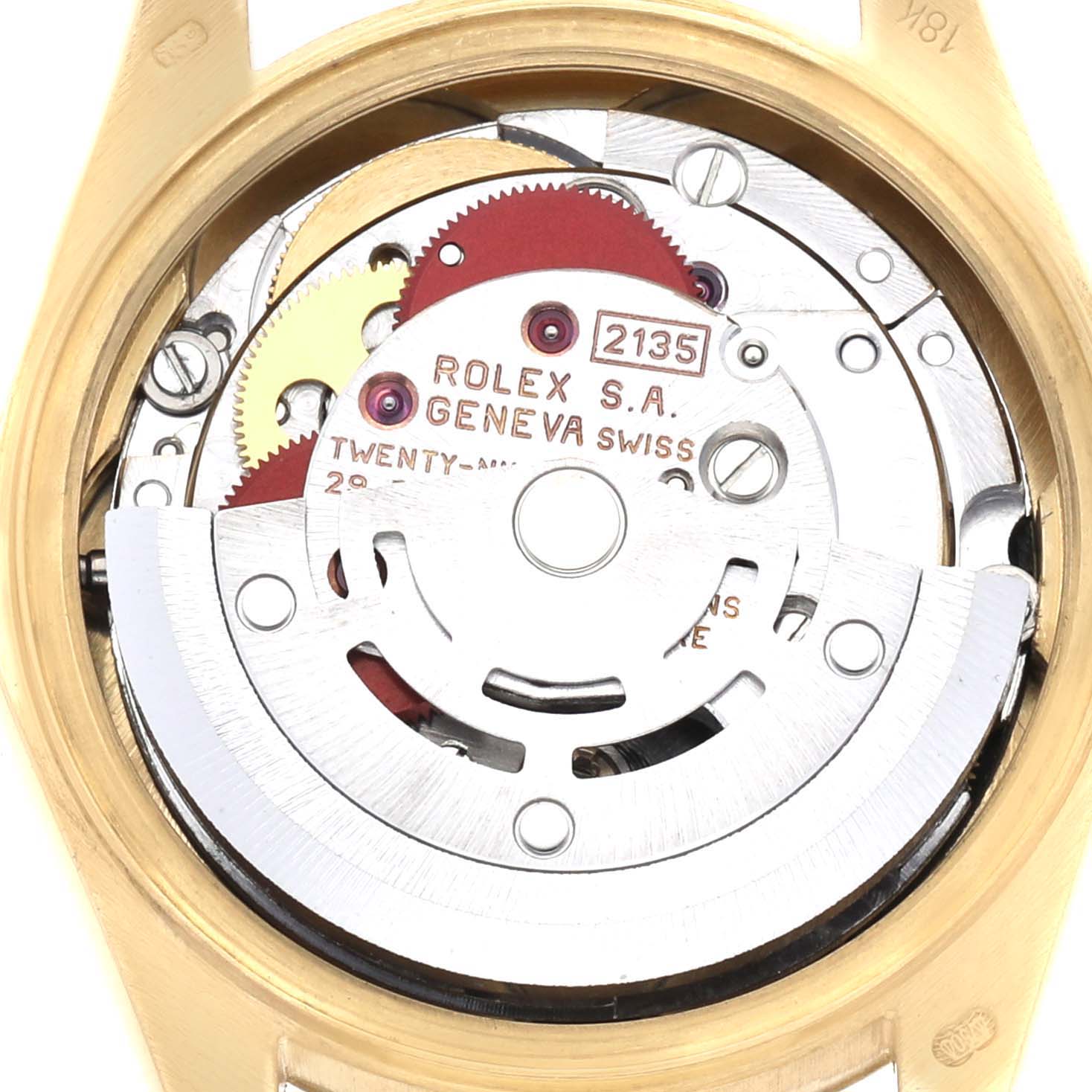 The image shows the internal movement of a Rolex President 69178 Women's Yellow Gold Black Dial watch from a top-down angle, highlighting gears and rotor.