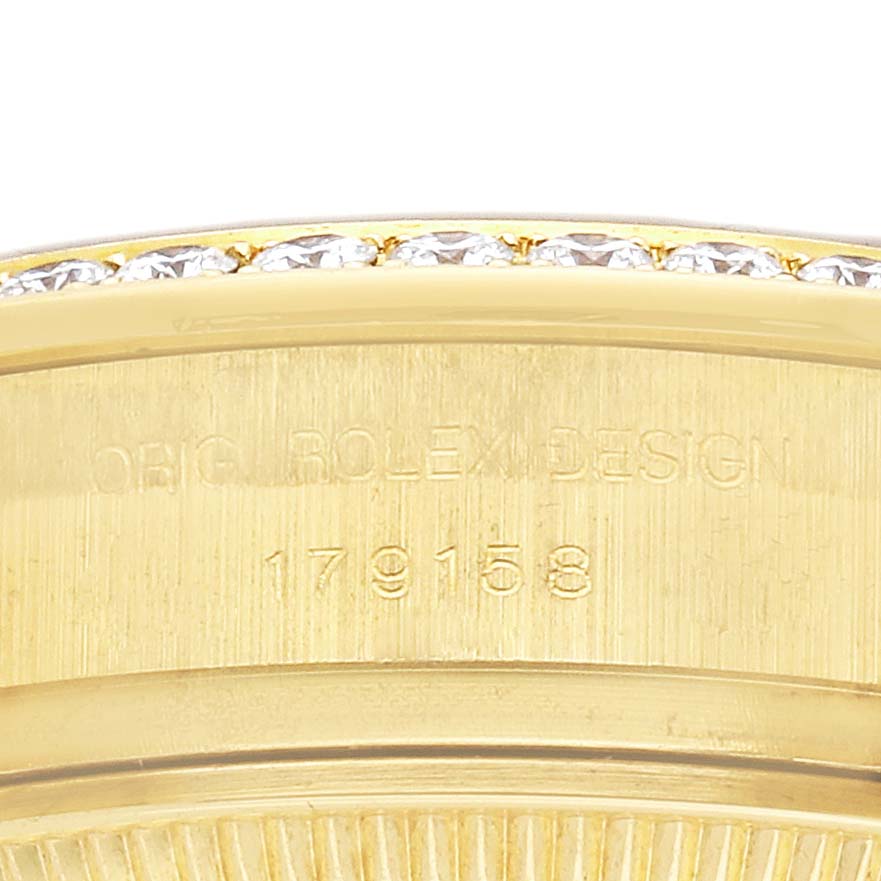 The image shows the case back of a Rolex President 179158 Women's Yellow Gold Champagne Dial watch, featuring the model number and design engraving.
