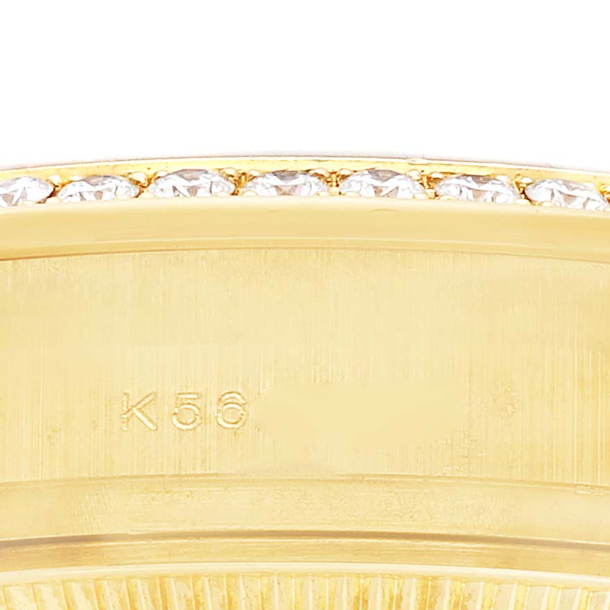 The image shows a close-up of the bezel and upper case edge of a Rolex President 179158 Women's Yellow Gold Champagne Dial watch, highlighting its diamond detailing.