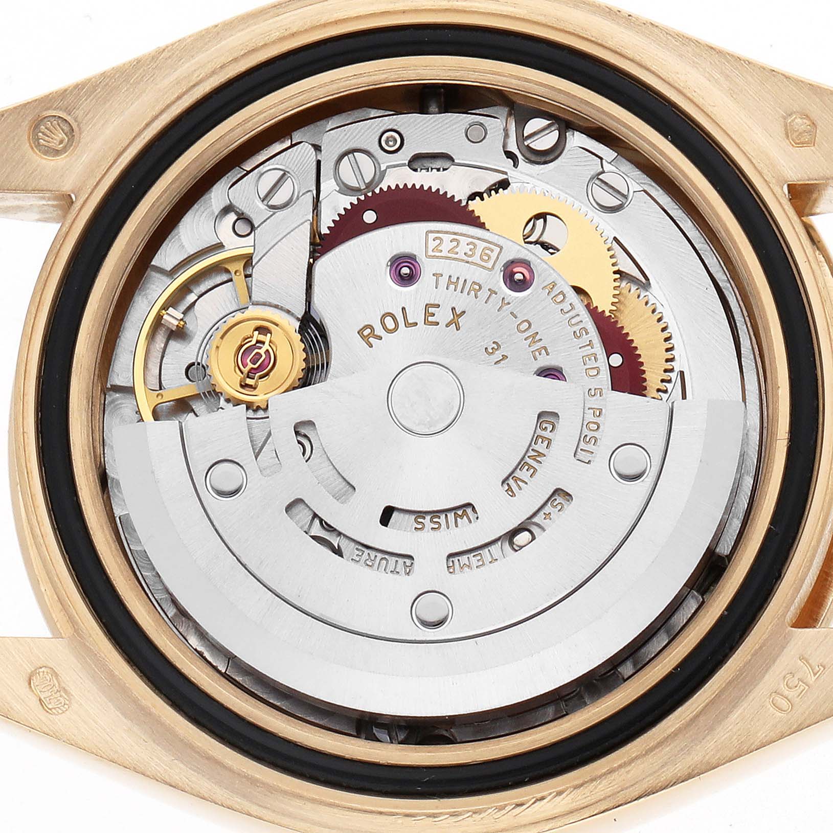 The image shows the movement of a Rolex President 279178 Women's Yellow Gold Champagne Dial watch from a top-down angle, highlighting gears and internal components.