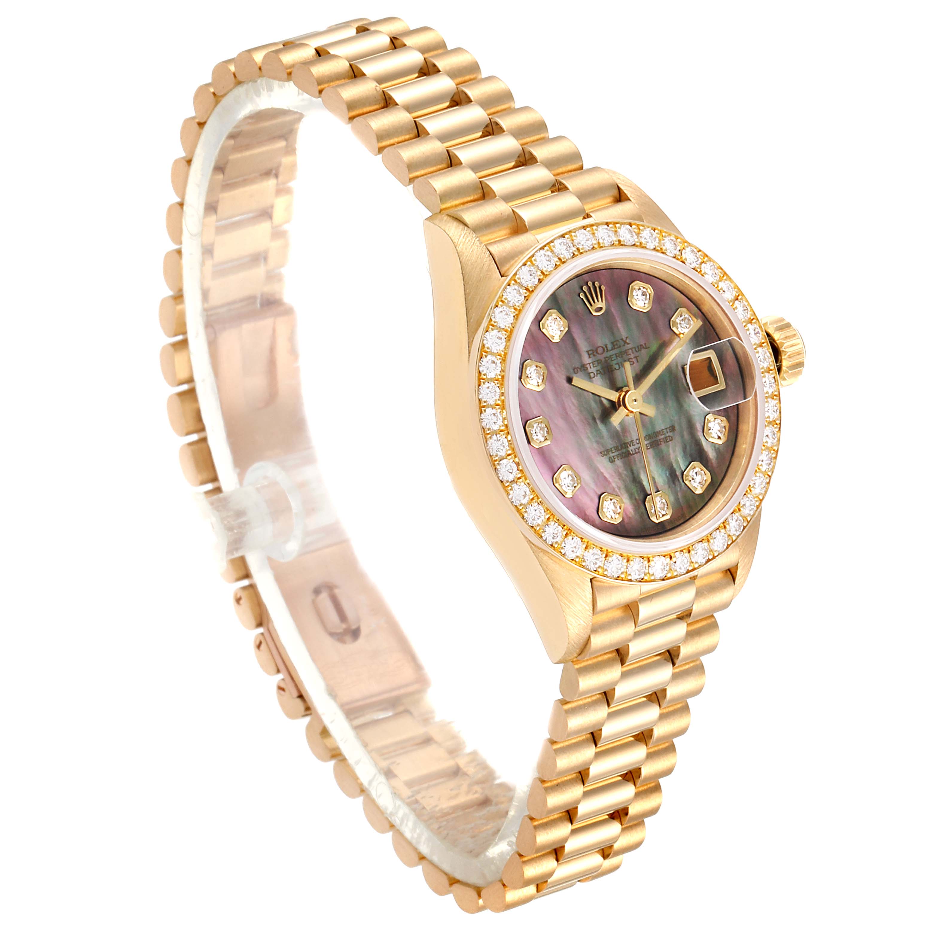 The image shows a Rolex President 69138 Women's Yellow Gold Mother of Pearl Dial 69138 Women's Yellow Gold Mother of Pearl Dial model watch with a gold band, a diamond bezel, and a mother-of-pearl dial from a side-angled view.