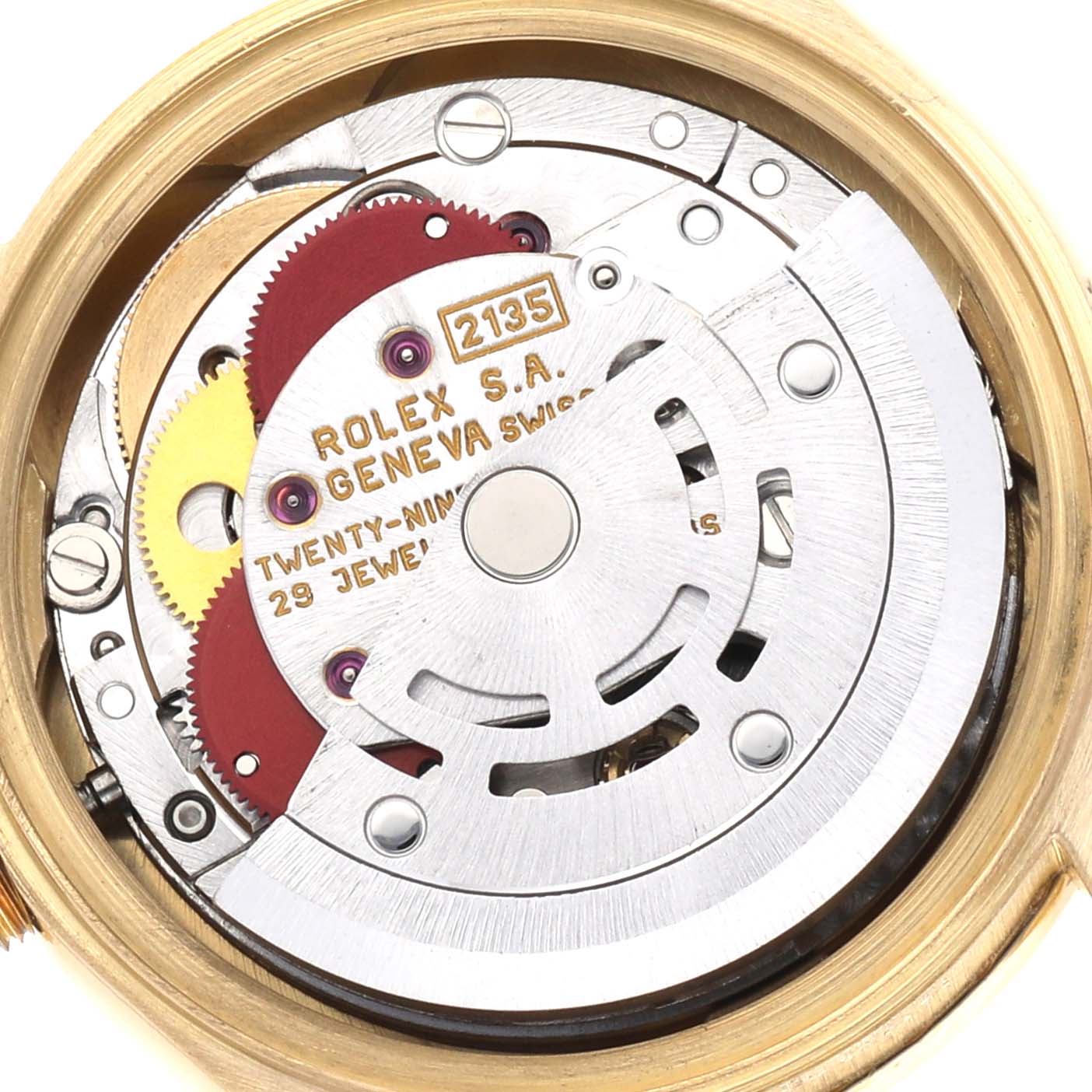 The image shows the internal mechanism of a Rolex President 69158 Women's Yellow Gold Champagne Dial watch, focusing on the movement and gears.