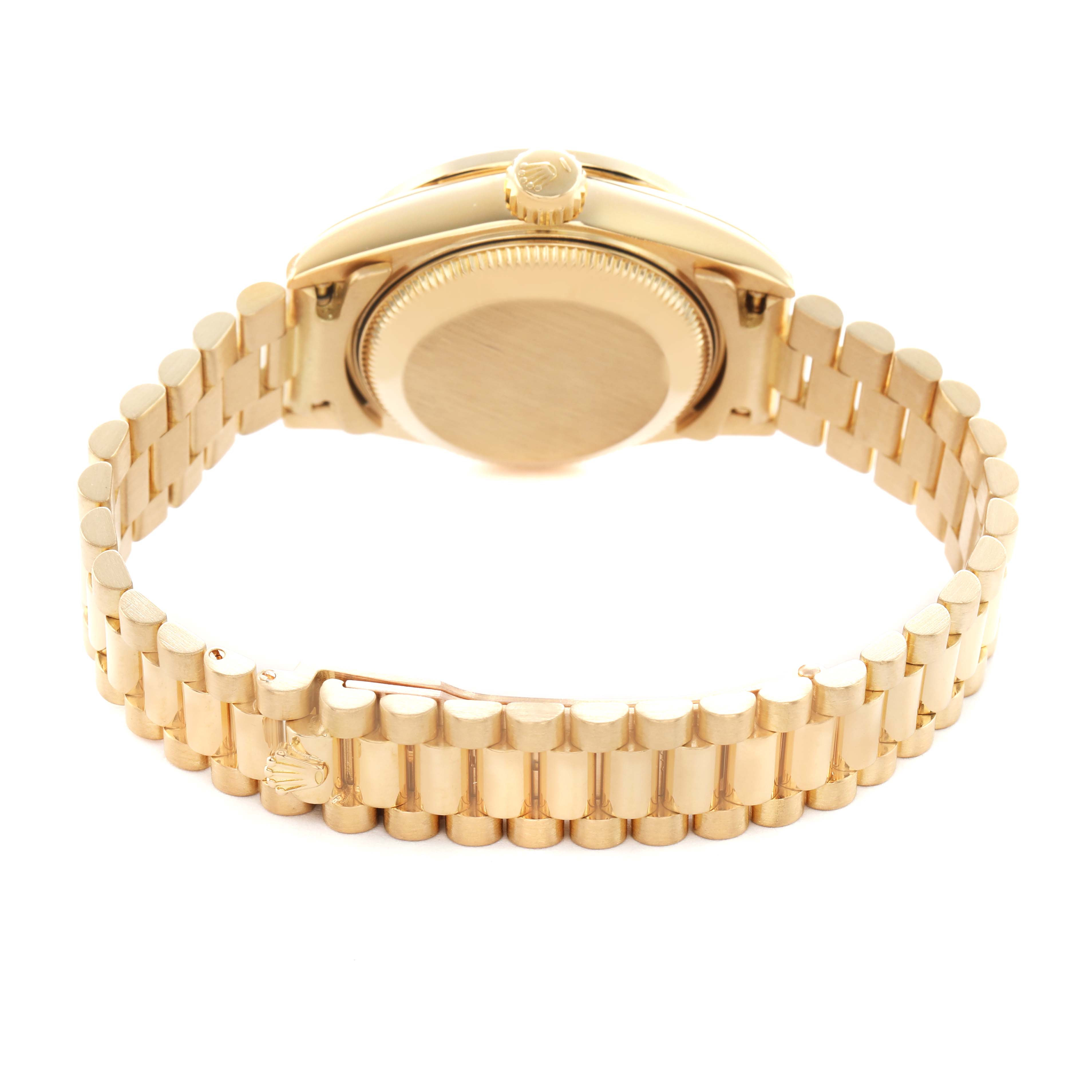 The image shows the back of a Rolex President 69158 Women's Yellow Gold Champagne Dial watch with the case back and bracelet visible.