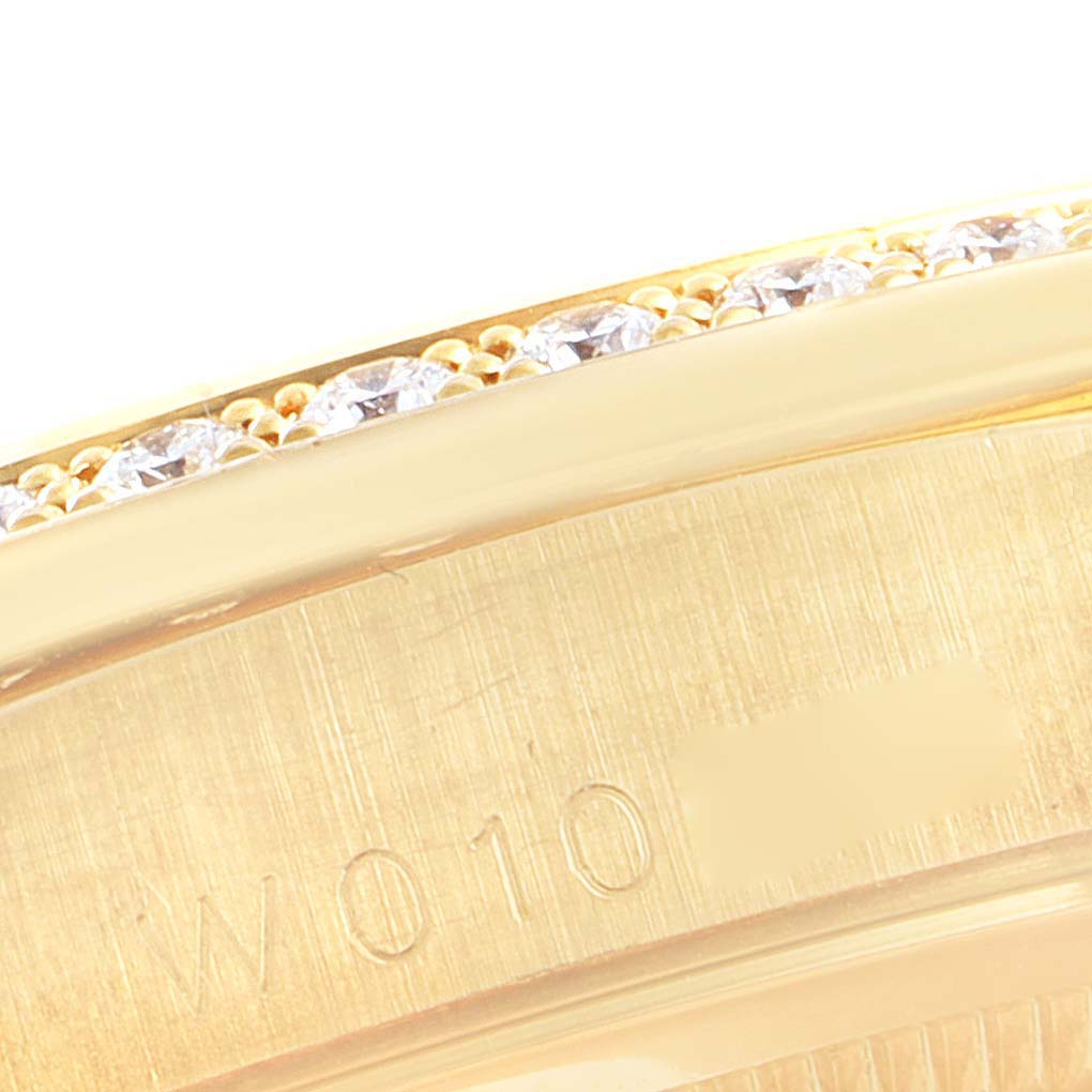This close-up image shows the gold edge and diamond bezel detail of a Rolex President 18238 Men's Yellow Gold Silver Dial 18238 Men's Yellow Gold Silver Dial model watch.