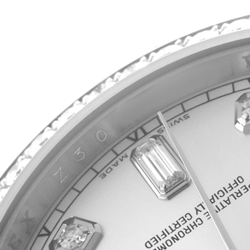 The image shows a close-up angle of a Rolex President 118389 Men's White Gold Silver Dial watch, highlighting its diamond hour markers and part of the dial.