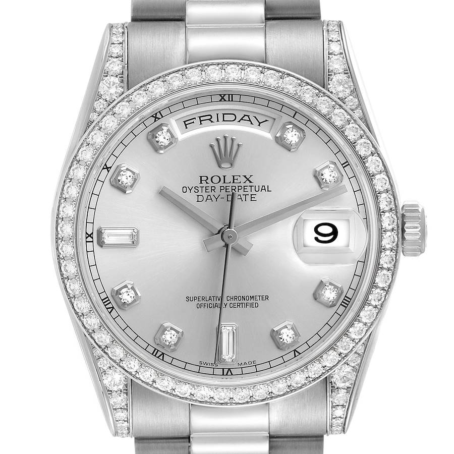 The image shows a front view of a Rolex President 118389 Men's White Gold Silver Dial watch, highlighting the dial, diamond bezel, and part of the bracelet.