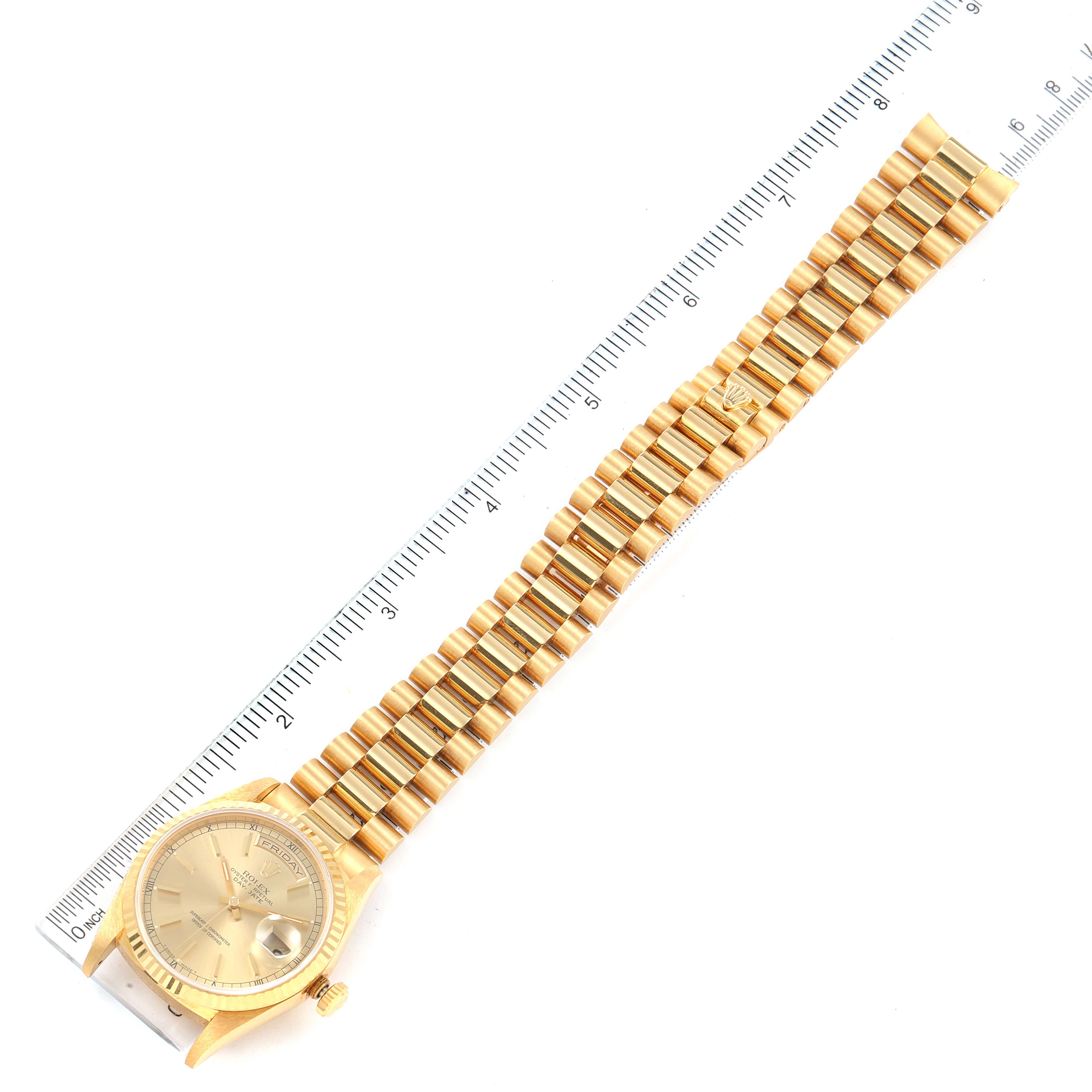 The image displays a Rolex President 18238 Men's Yellow Gold Champagne Dial 18238 Men's Yellow Gold Champagne Dial model watch laid flat alongside a ruler, showing the dial, case, and bracelet.