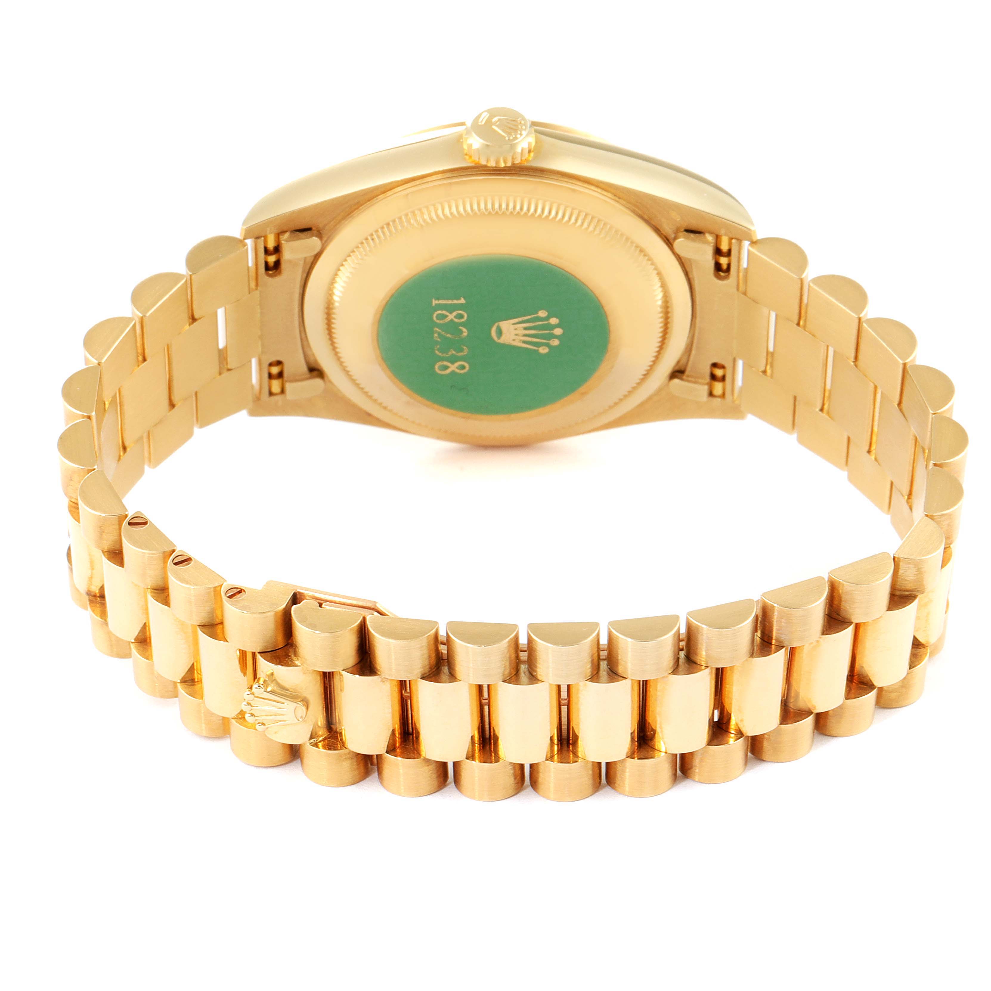 This image shows the back view of a Rolex President 18238 Men's Yellow Gold Champagne Dial 18238 Men's Yellow Gold Champagne Dial model watch, featuring its clasp and bracelet in gold.