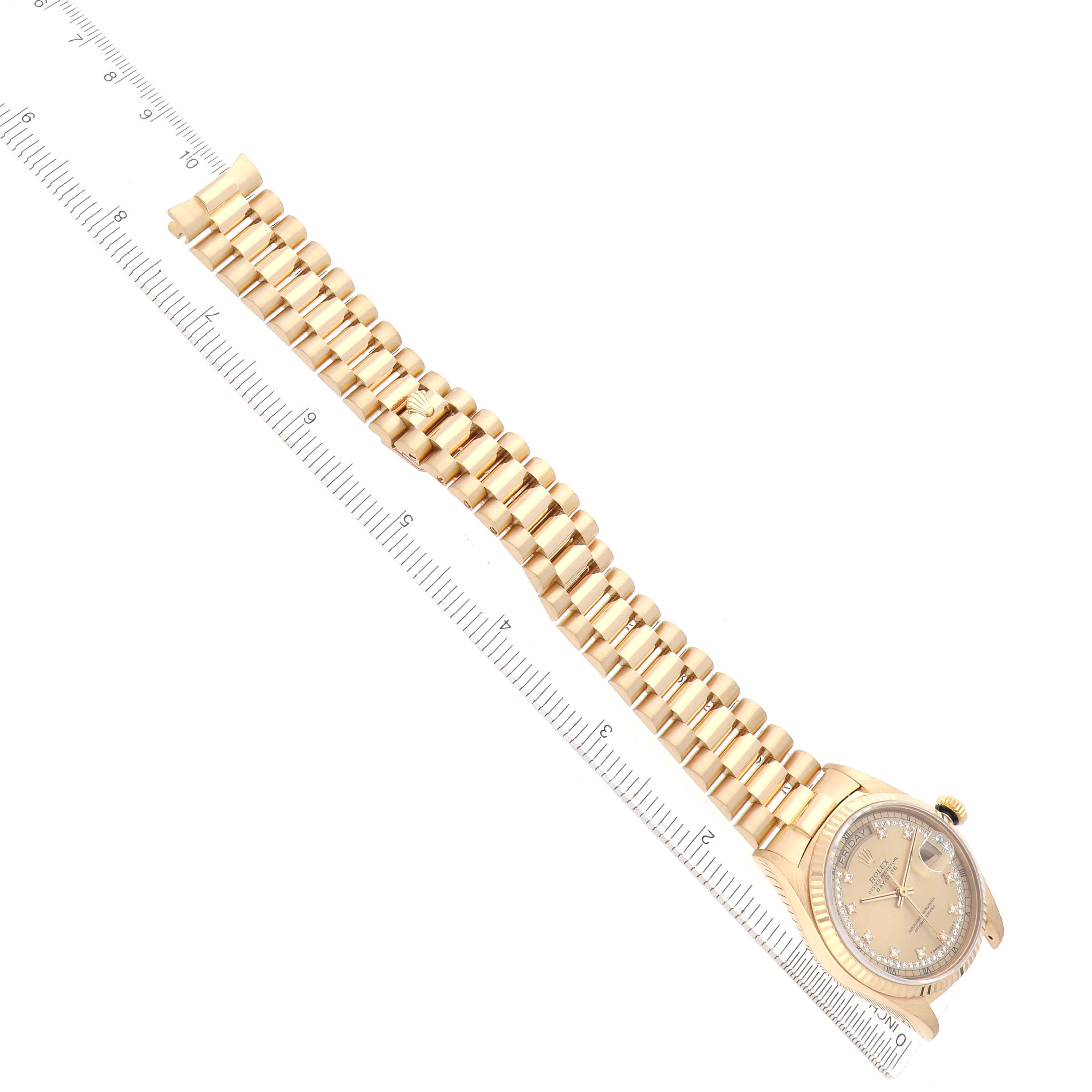 The Rolex President 18038 Men's Yellow Gold Champagne Dial model watch is shown at a diagonal angle, displaying the watch face, bracelet, and a ruler for scale.
