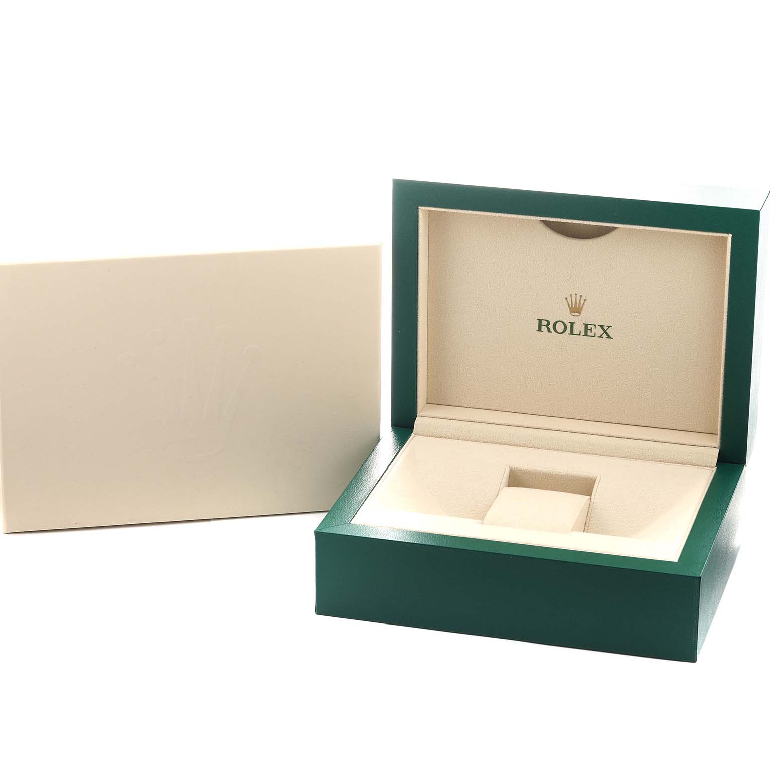 The image shows an open Rolex President 279135 Women's Rose Gold Pink Dial model watch box, with the lid angled upward and the brand logo visible inside.