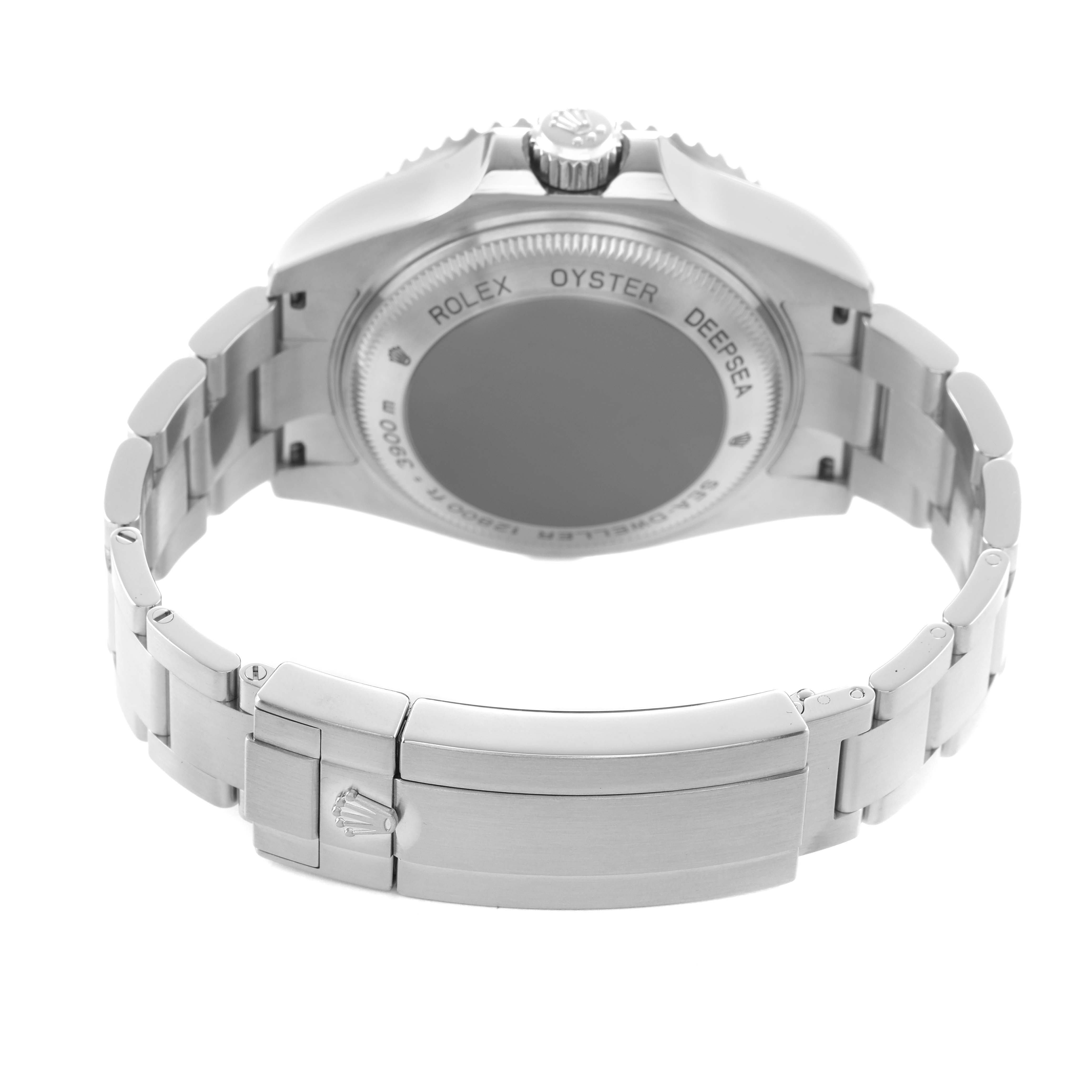 The Rolex Sea-Dweller 116660 Men's Stainless Steel Blue Dial watch is shown from the back, highlighting the case back, crown, and bracelet clasp.