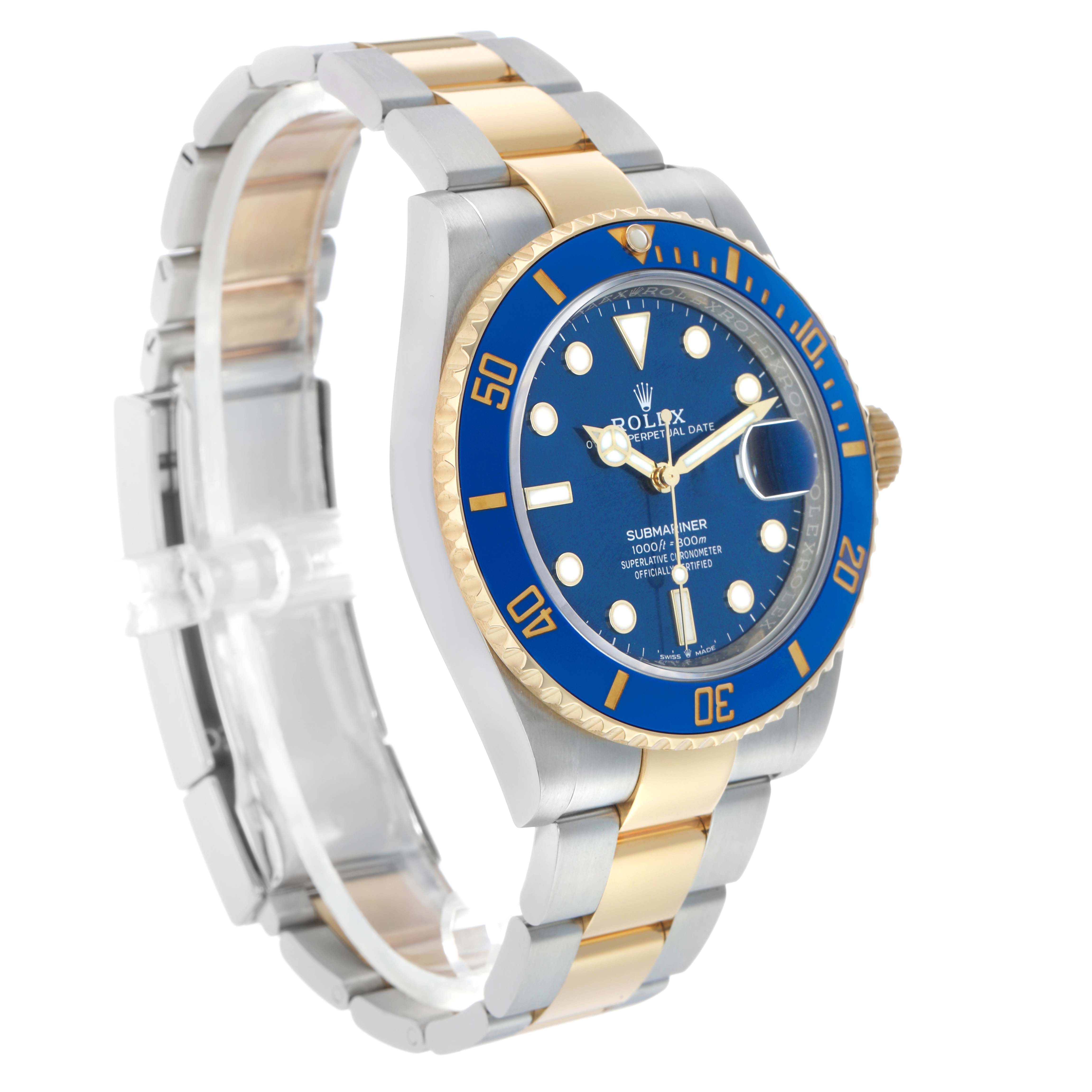 The Rolex Submariner 126613 Men's Steel and Gold (two tone) Blue Dial watch is angled to show the face, bezel, and bracelet, highlighting its blue and gold design.