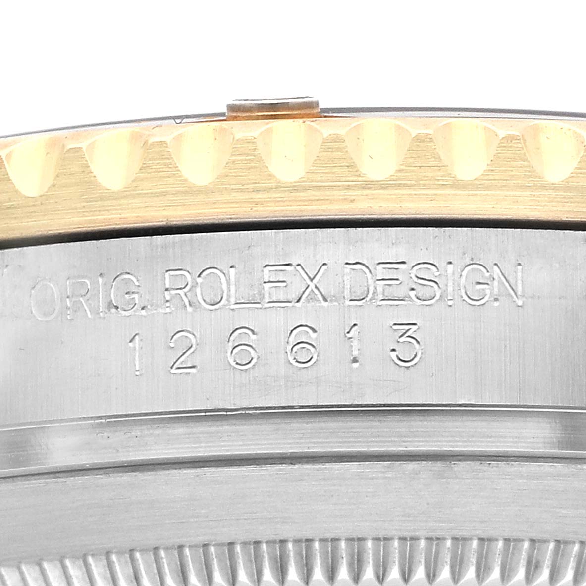 The image shows a close-up of the side of a Rolex Submariner 126613 Men's Steel and Gold (two tone) Black Dial, highlighting the model number and part of the bezel.