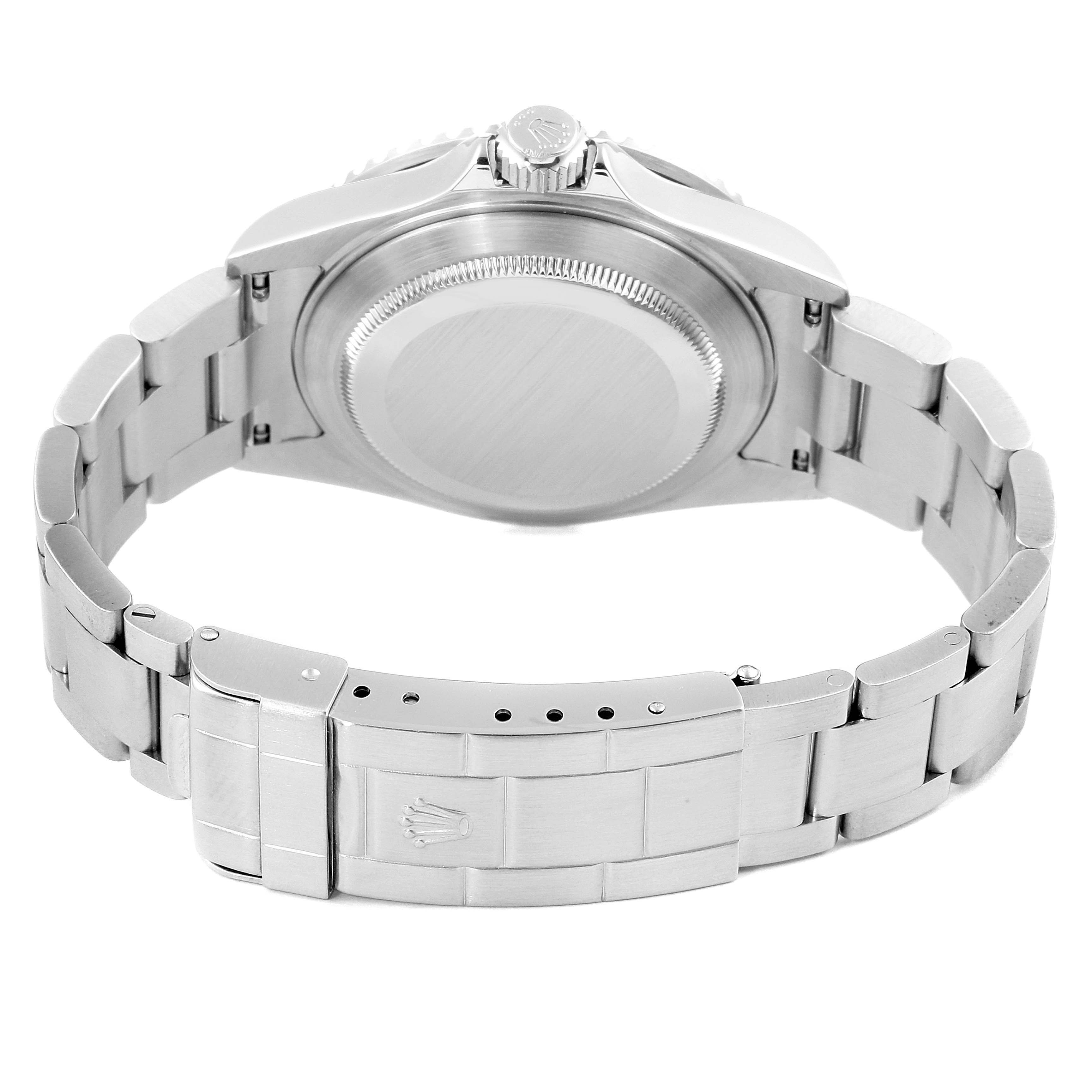 The image shows the back case and bracelet clasp of a Rolex Submariner 16610 Men's Stainless Steel Black Dial 16610 Men's Stainless Steel Black Dial watch from a rear angle.